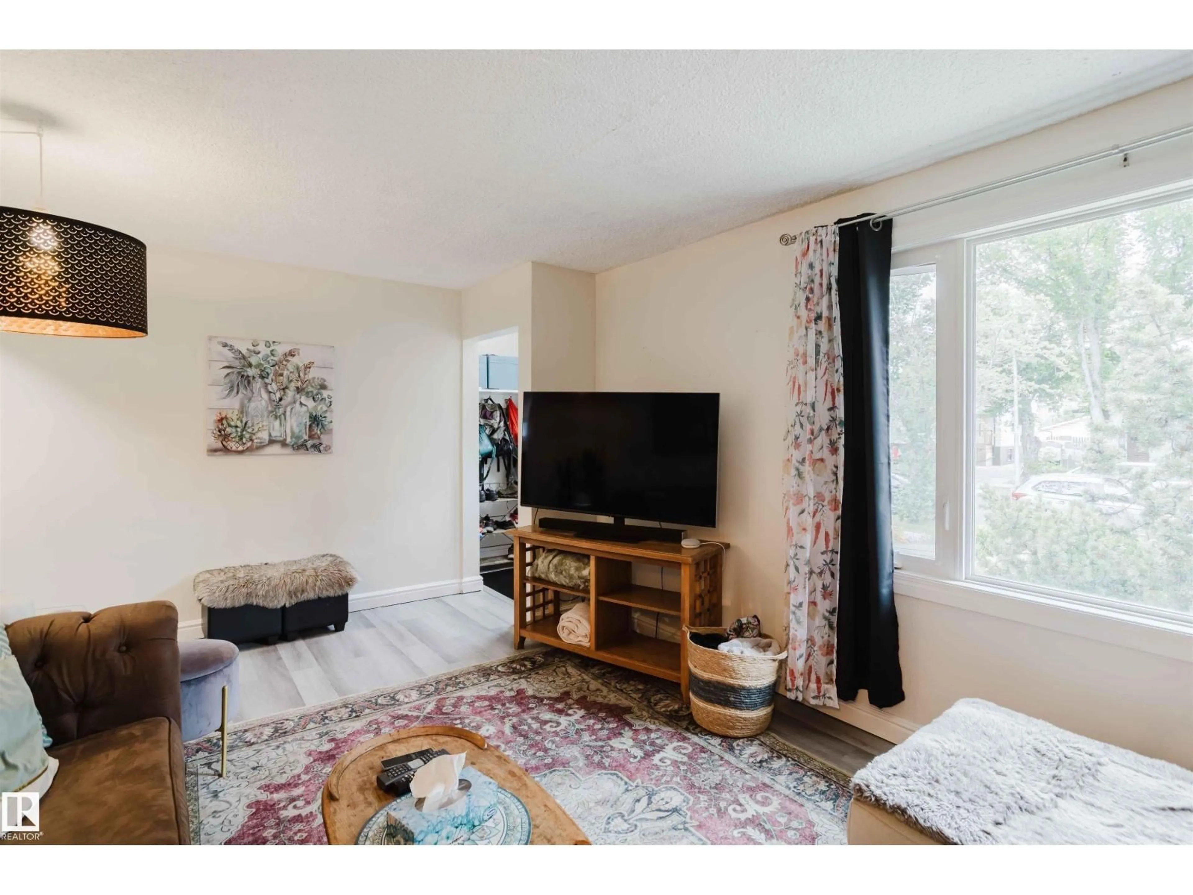 Living room with furniture, unknown for 12026 104 ST, Edmonton Alberta T5G2L4