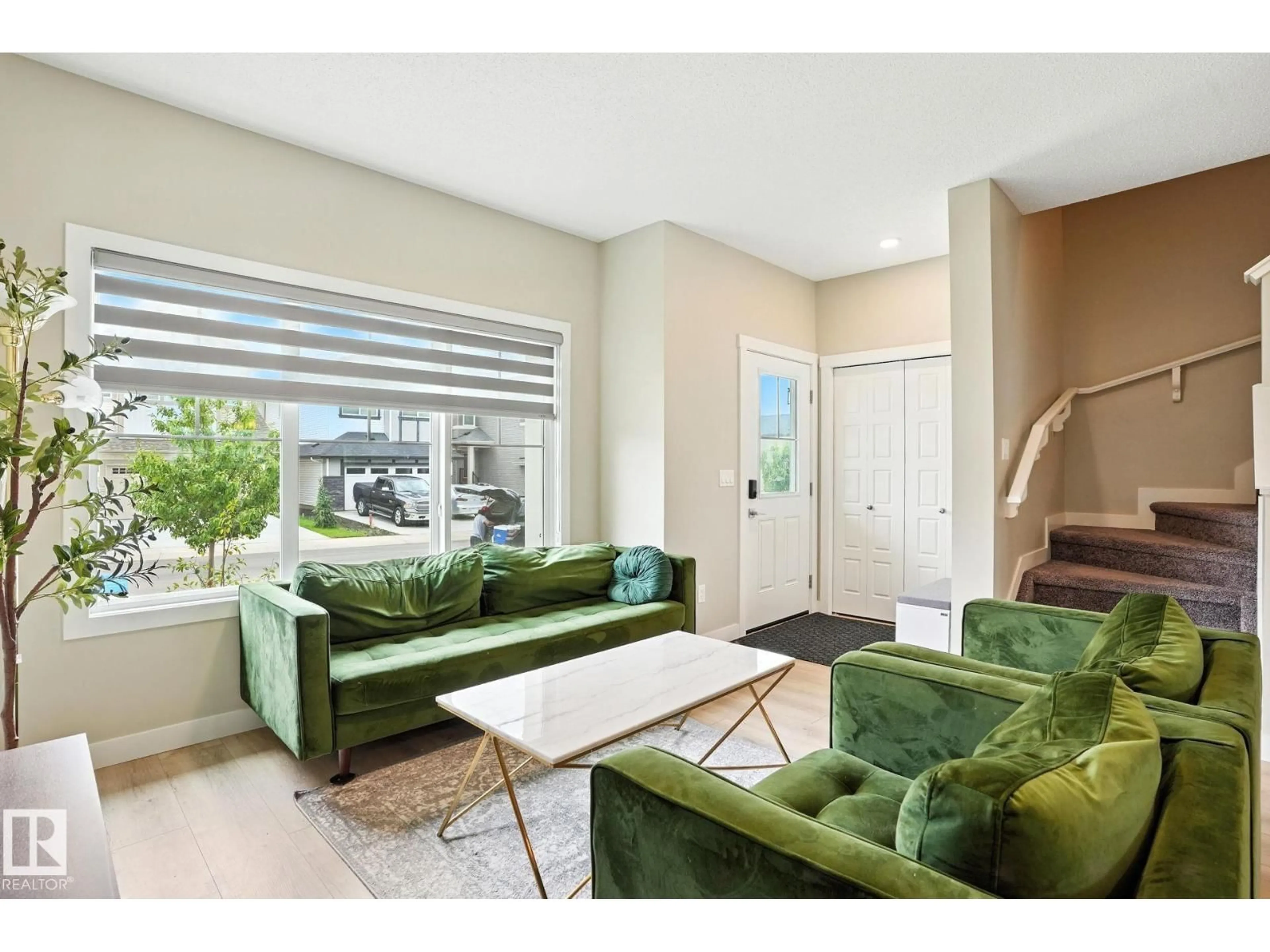 Living room with furniture, unknown for 6260 175 AV, Edmonton Alberta T5Y4H3