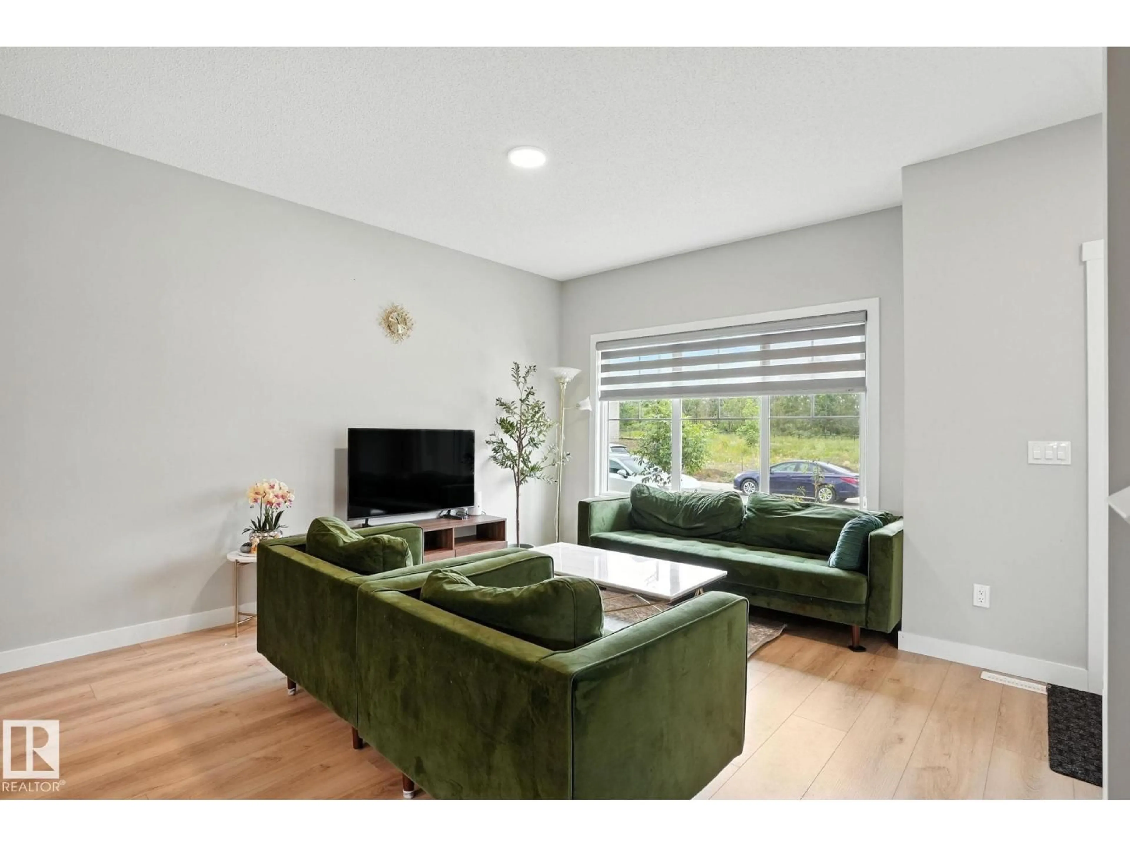 Living room with furniture, unknown for 6260 175 AV, Edmonton Alberta T5Y4H3