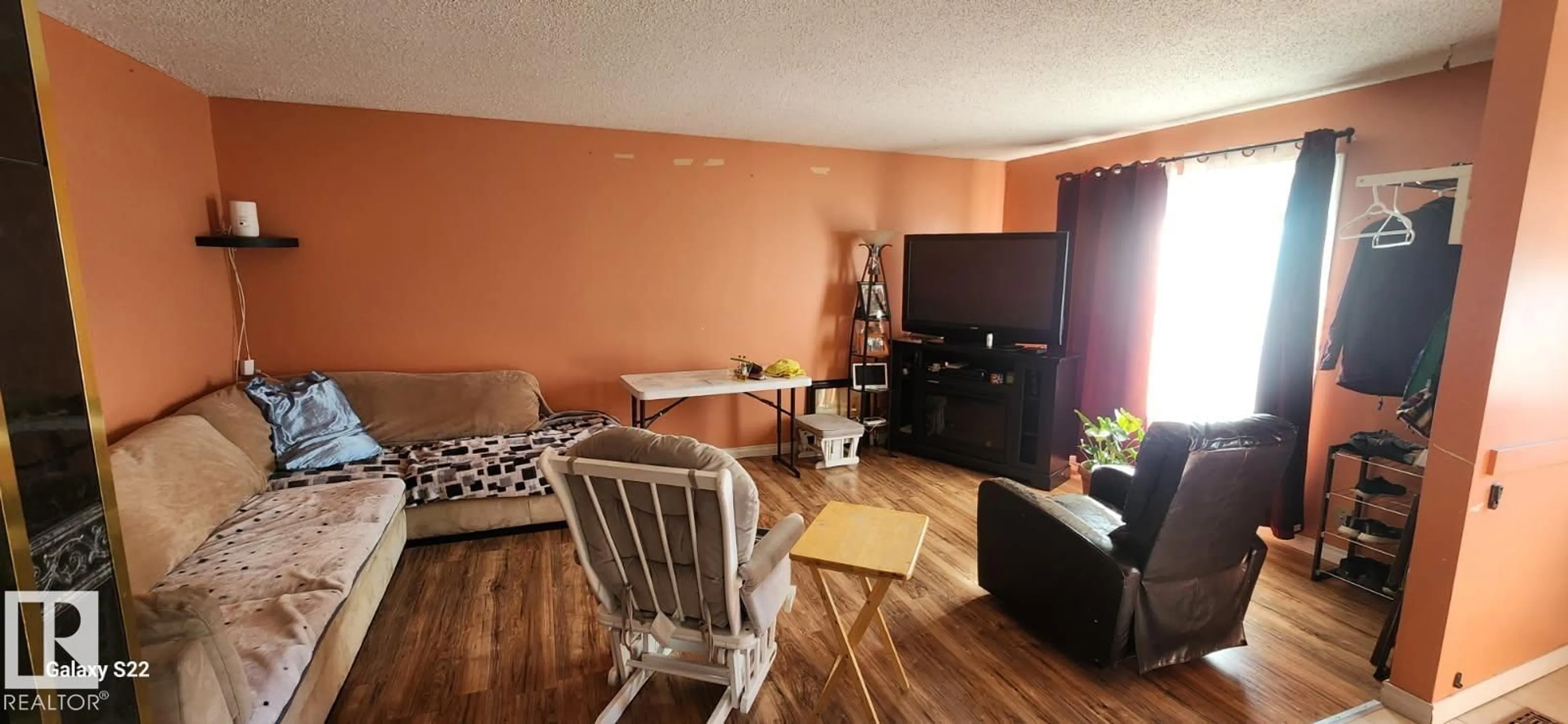 Living room with furniture, wood/laminate floor for 14411 31 ST, Edmonton Alberta T5Y1Z1