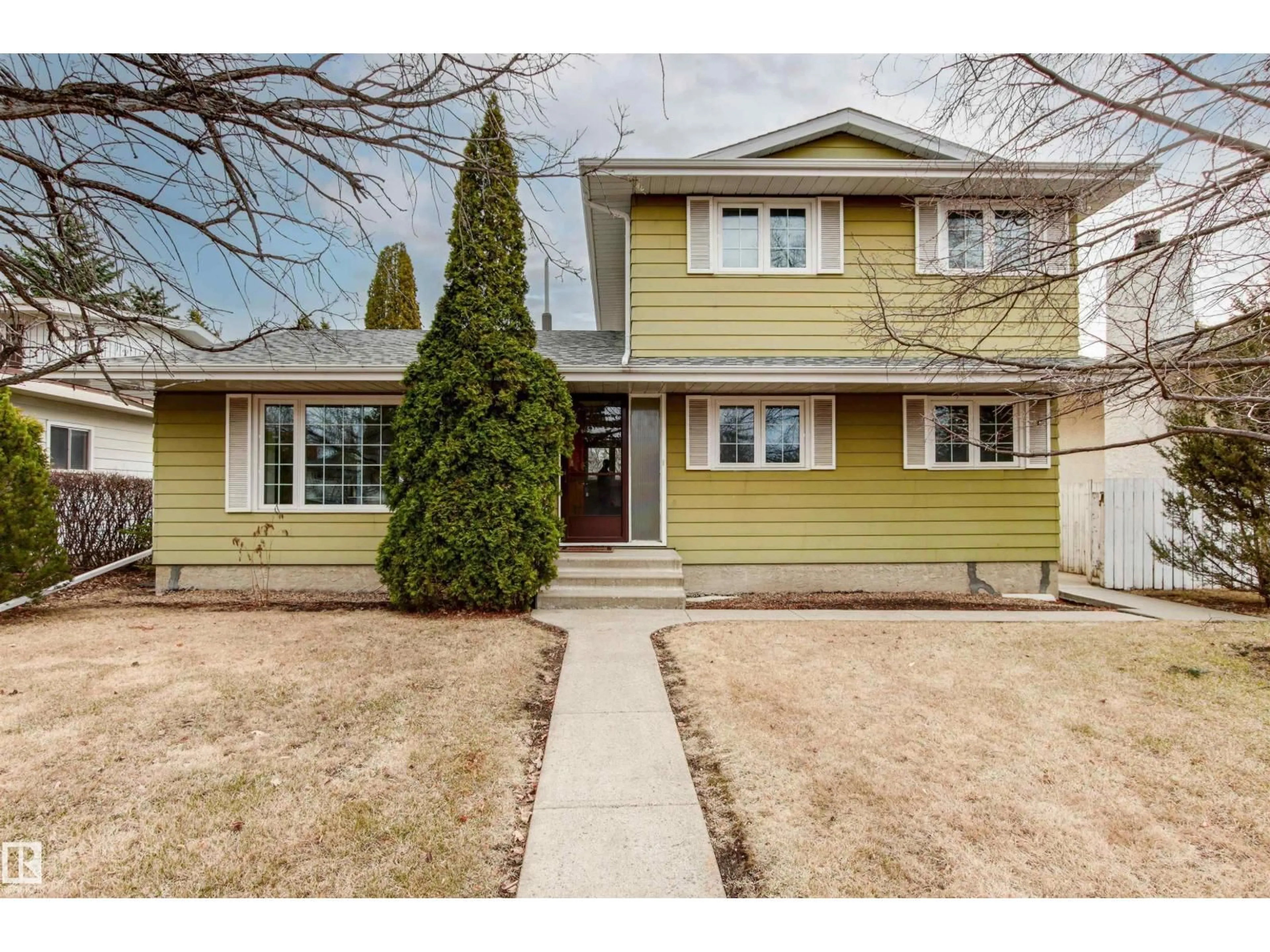 Home with vinyl exterior material, street for NW - 5011 143 ST, Edmonton Alberta T6H4E1