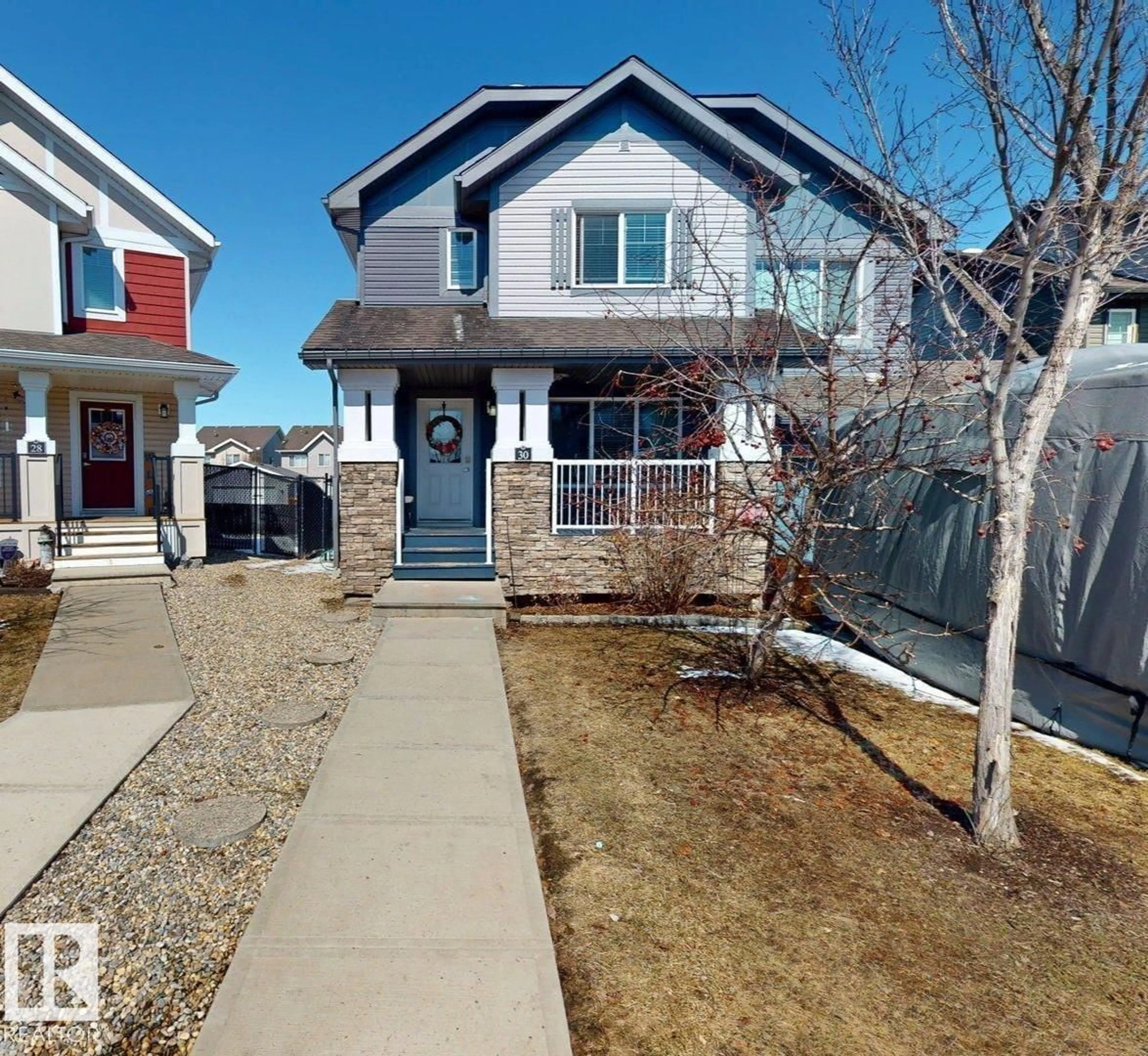 Home with vinyl exterior material, street for 30 SIERRA WD, Fort Saskatchewan Alberta T8L0T3