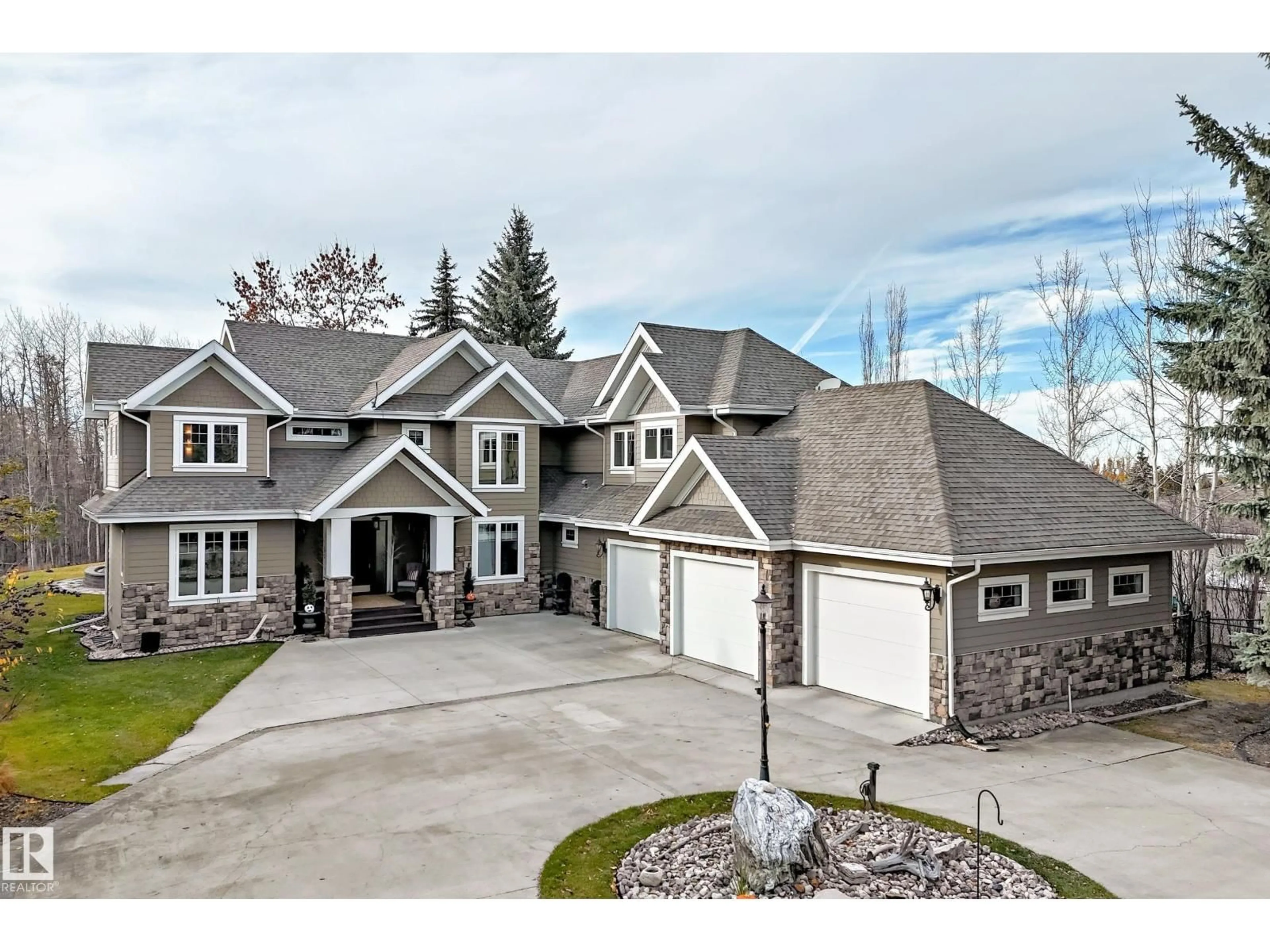 A pic from outside/outdoor area/front of a property/back of a property/a pic from drone, street for 53226 - 16 RGE ROAD 261, Rural Parkland County Alberta T7Y1A3