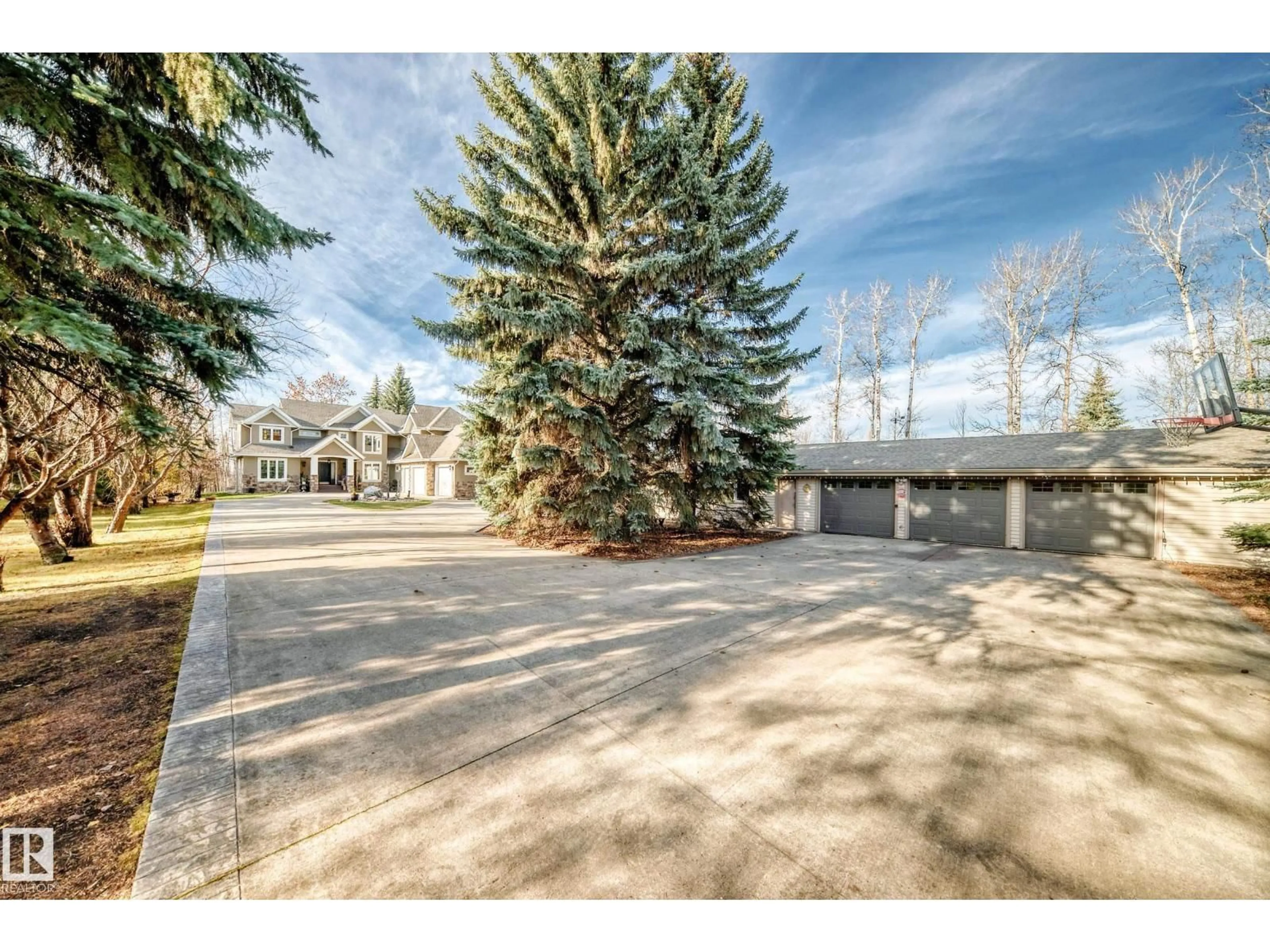 A pic from outside/outdoor area/front of a property/back of a property/a pic from drone, street for 53226 - 16 RGE ROAD 261, Rural Parkland County Alberta T7Y1A3