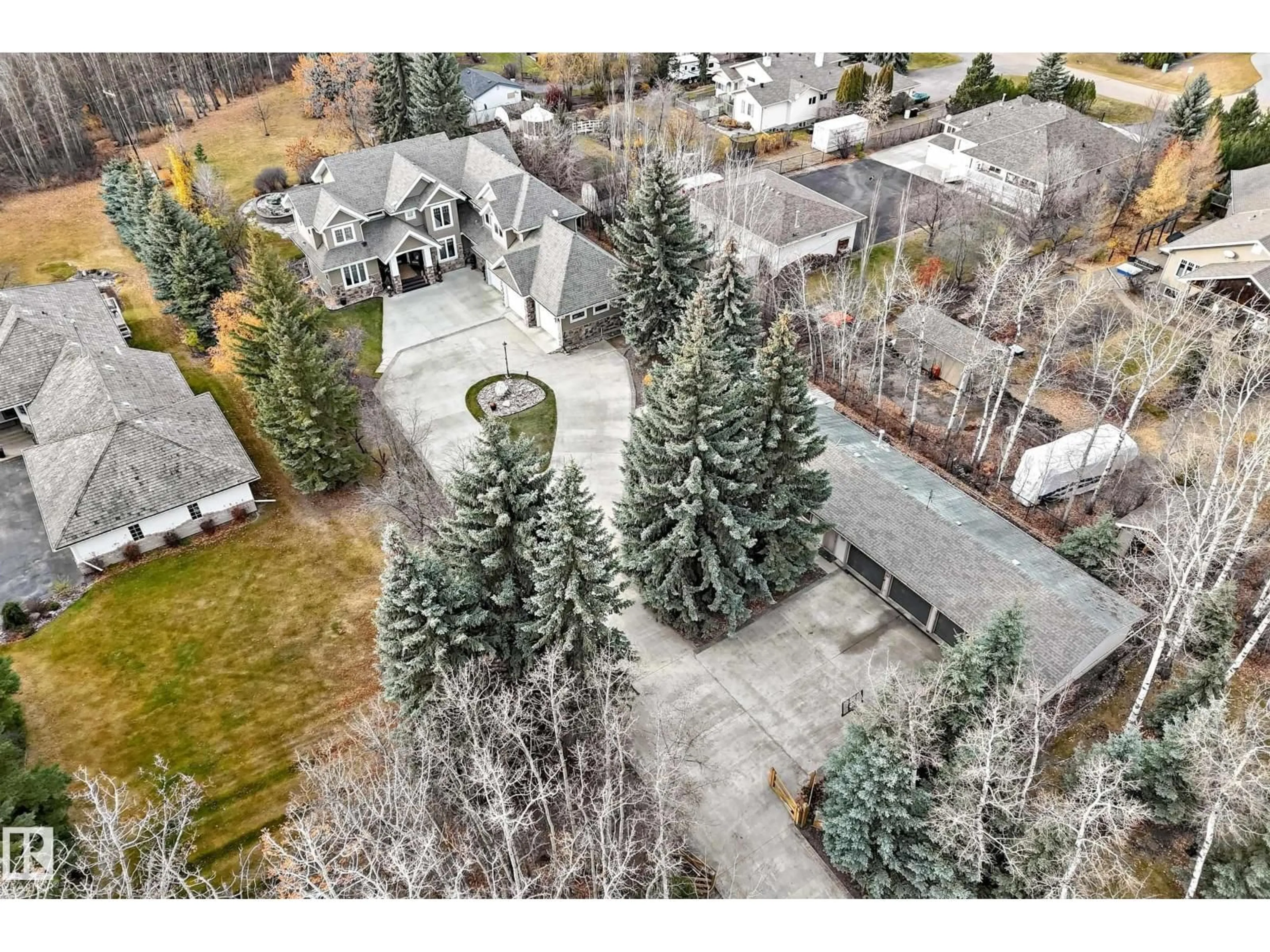 A pic from outside/outdoor area/front of a property/back of a property/a pic from drone, street for 53226 - 16 RGE ROAD 261, Rural Parkland County Alberta T7Y1A3