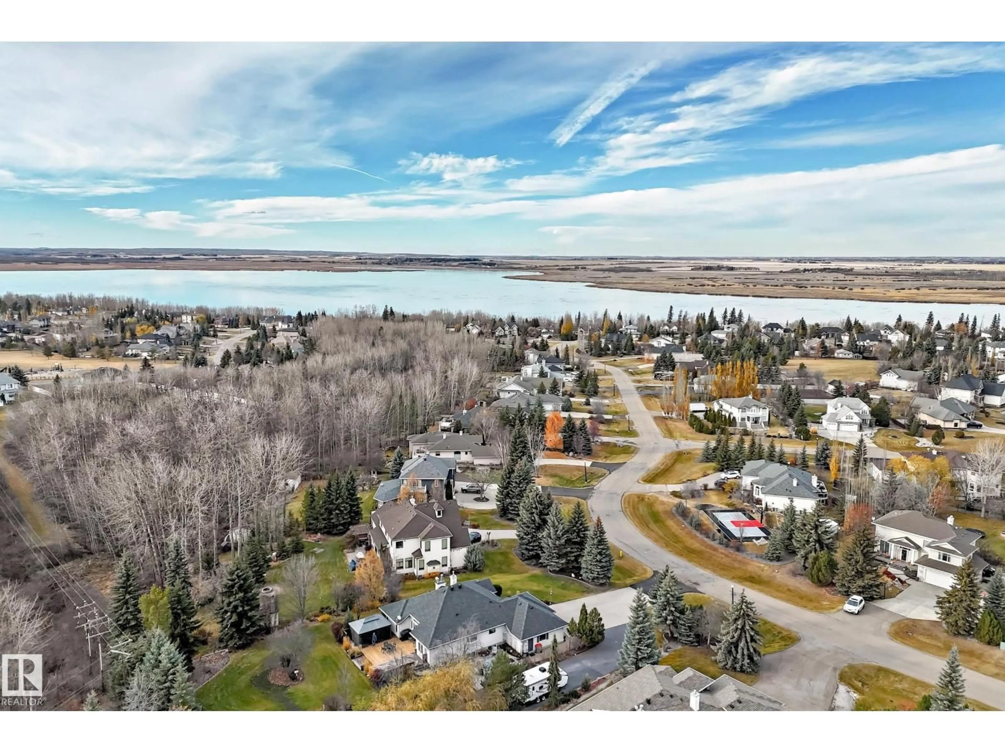 A pic from outside/outdoor area/front of a property/back of a property/a pic from drone, water/lake/river/ocean view for 53226 - 16 RGE ROAD 261, Rural Parkland County Alberta T7Y1A3