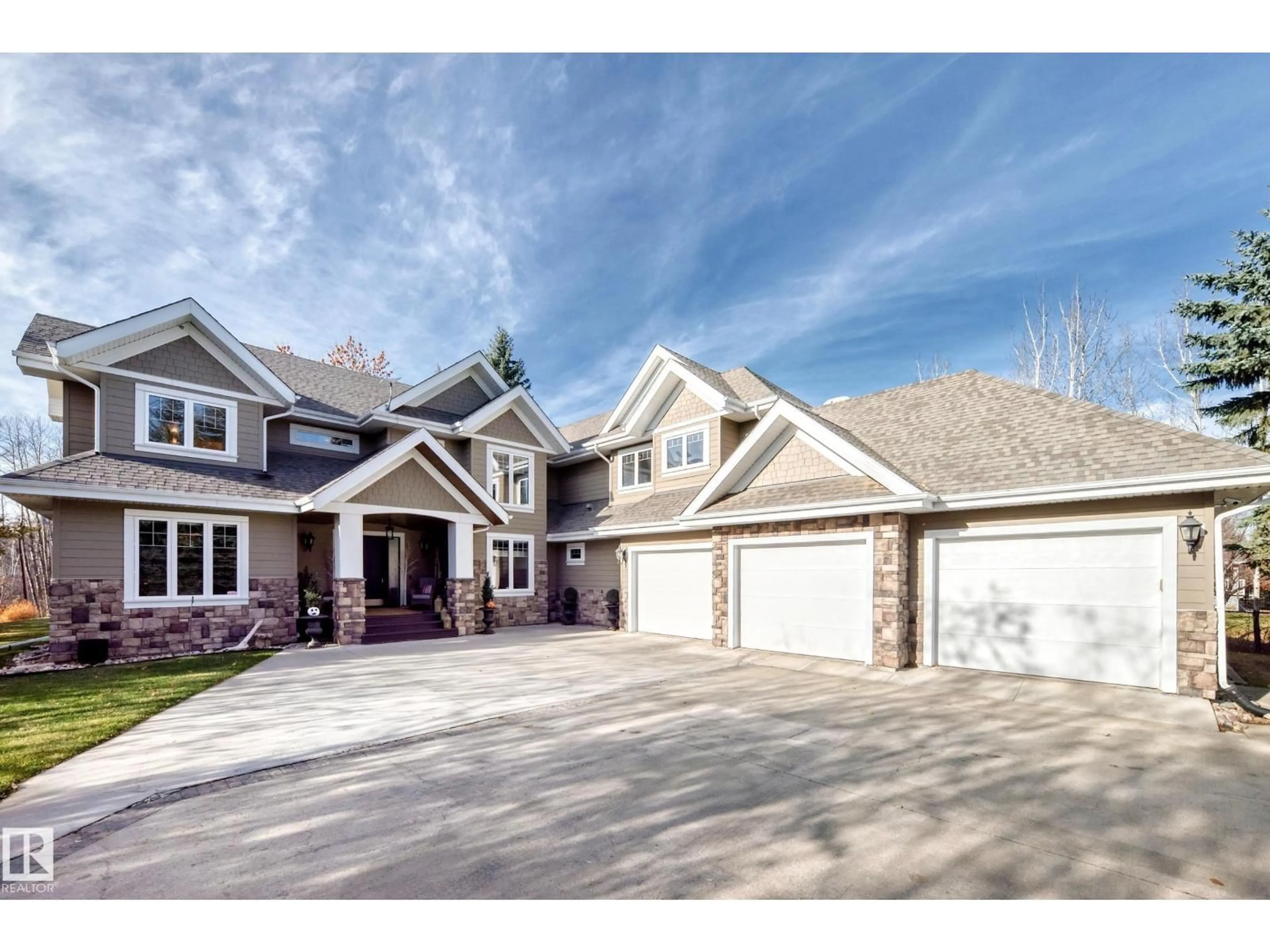 Home with brick exterior material, street for 53226 - 16 RGE ROAD 261, Rural Parkland County Alberta T7Y1A3