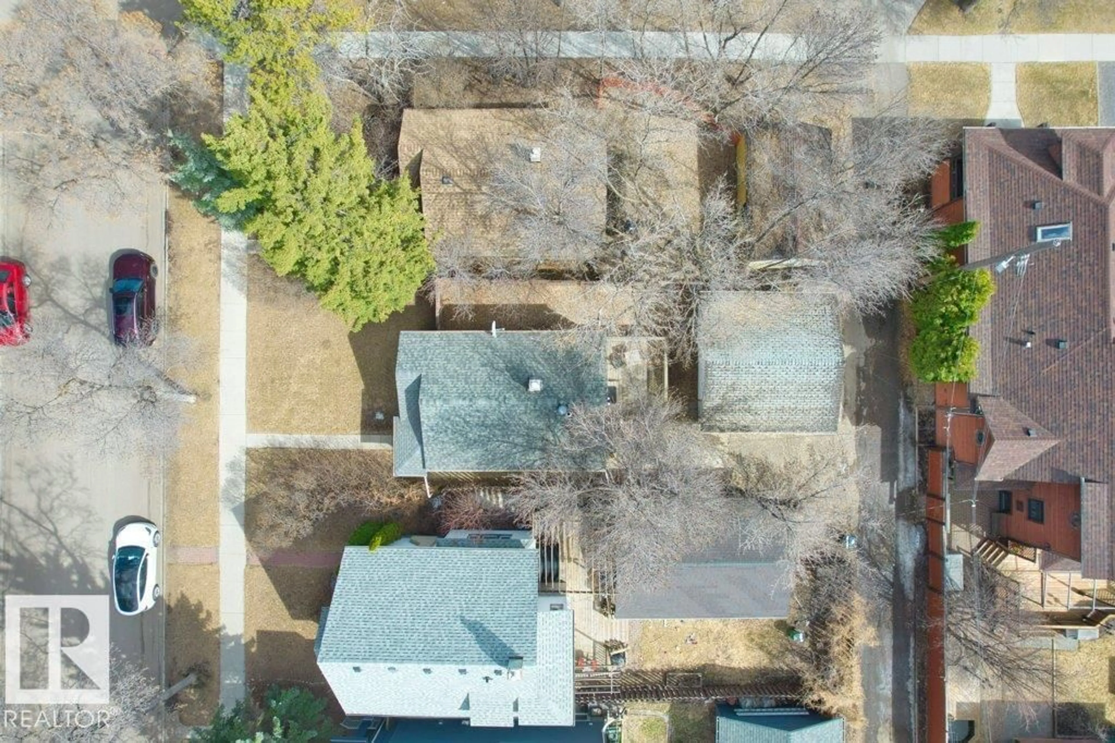 A pic from outside/outdoor area/front of a property/back of a property/a pic from drone, street for 12207 110 AV, Edmonton Alberta T5M2L2