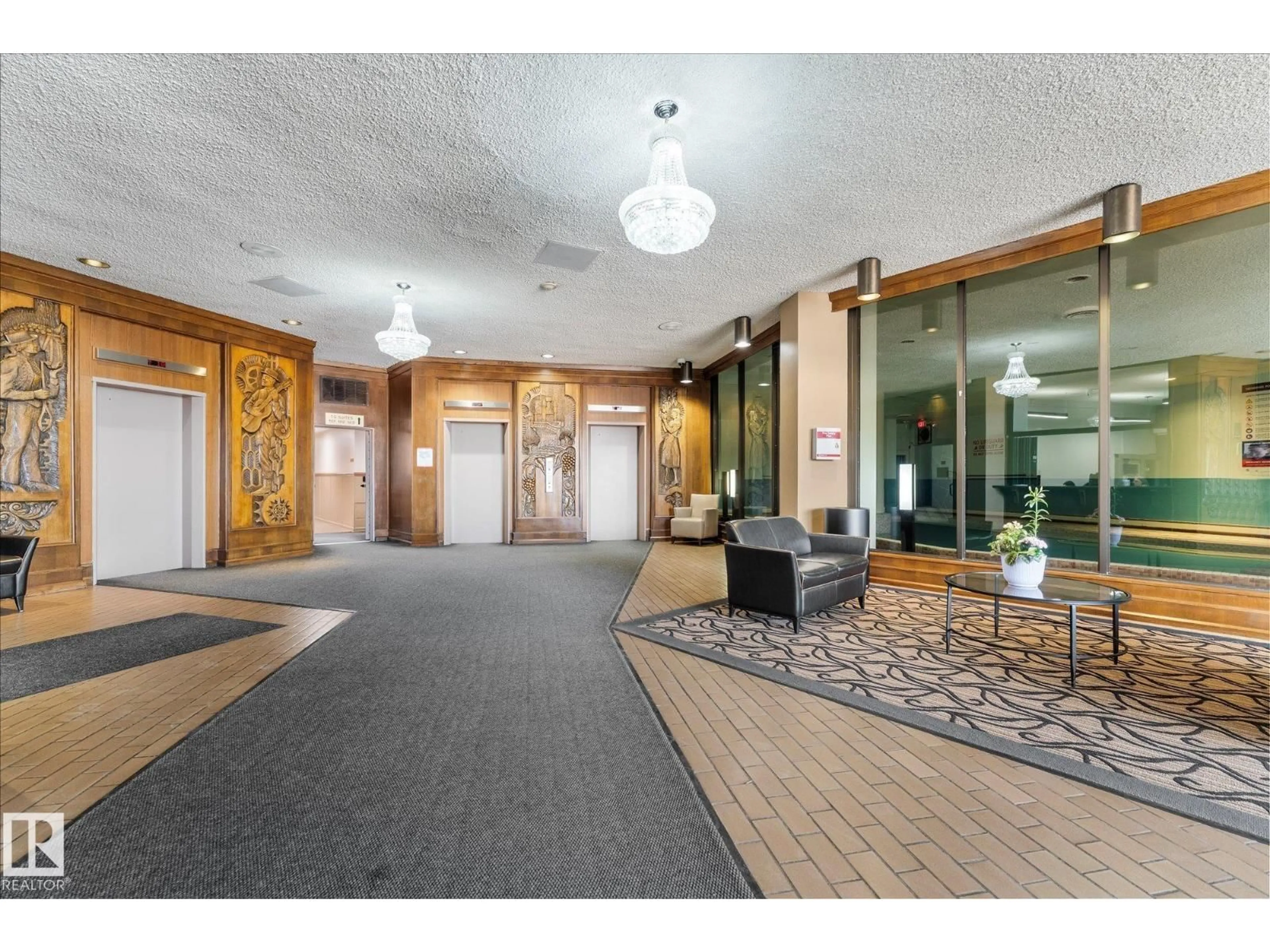 Indoor foyer for #102 - 13910 STONY PLAIN RD, Edmonton Alberta T5N3R2