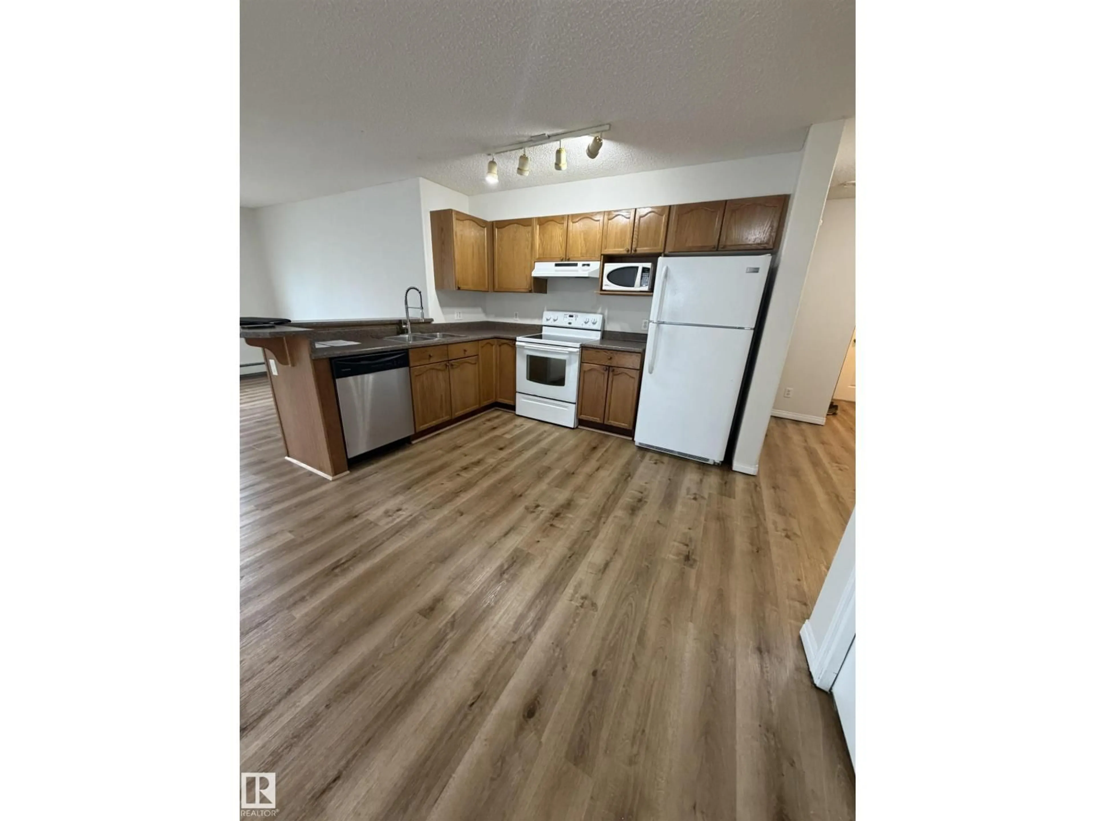 Standard kitchen, wood/laminate floor for #104 - 8119 112 AV, Edmonton Alberta T5B0G1