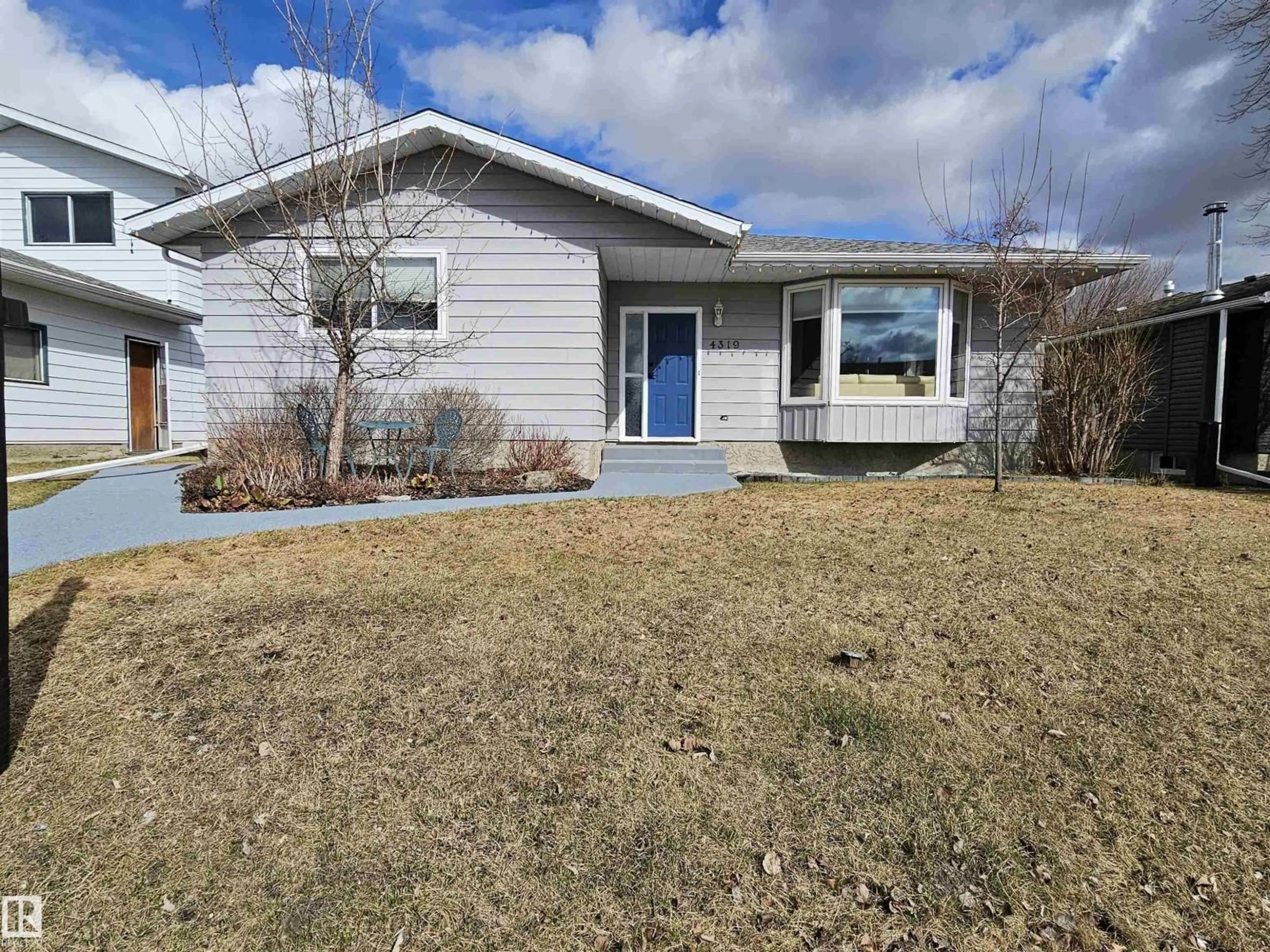Home with vinyl exterior material, street for 4319 54 ST, Drayton Valley Alberta T7A1K5