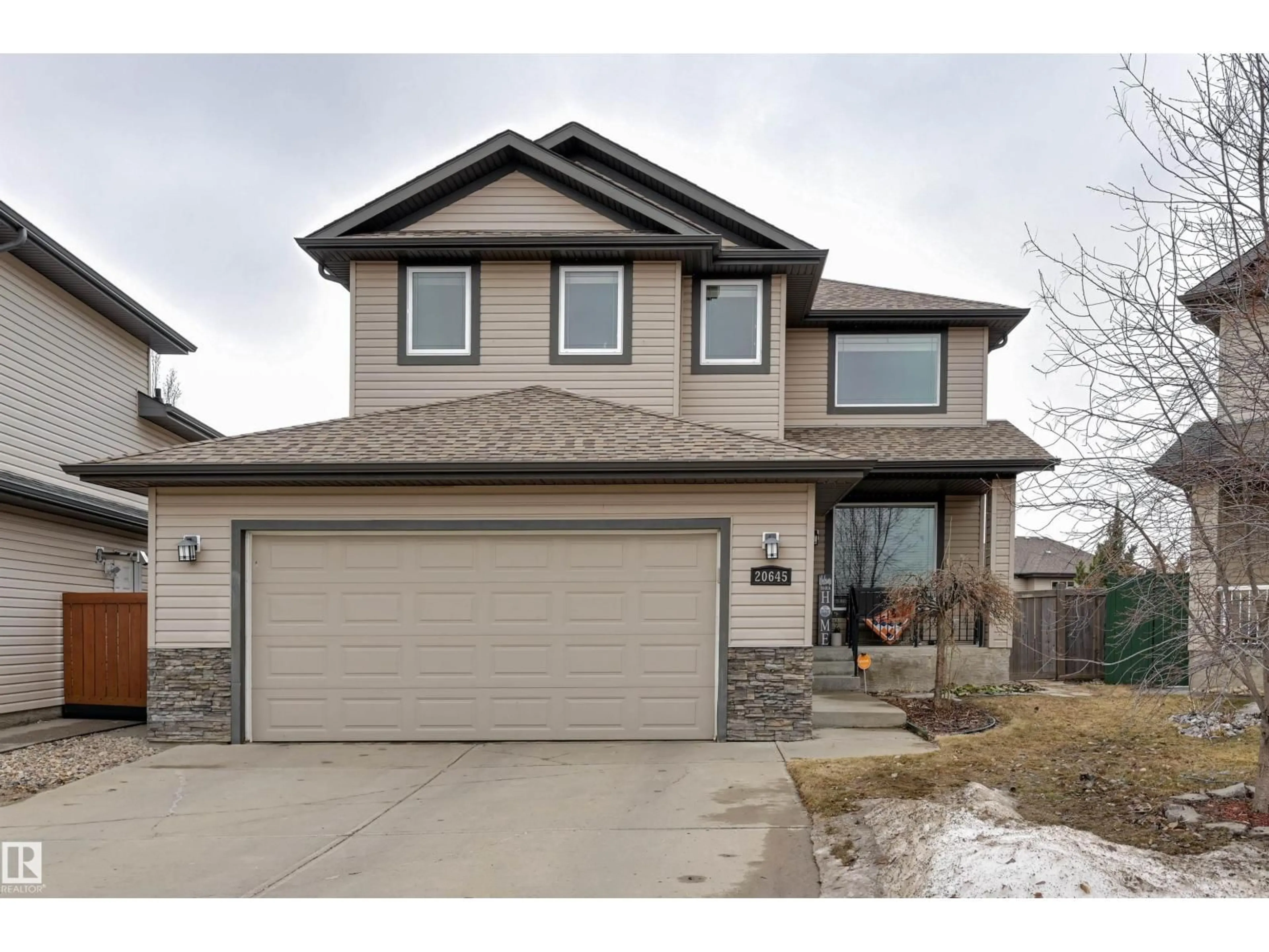 Home with brick exterior material, street for 20645 93A AV, Edmonton Alberta T5T4B5