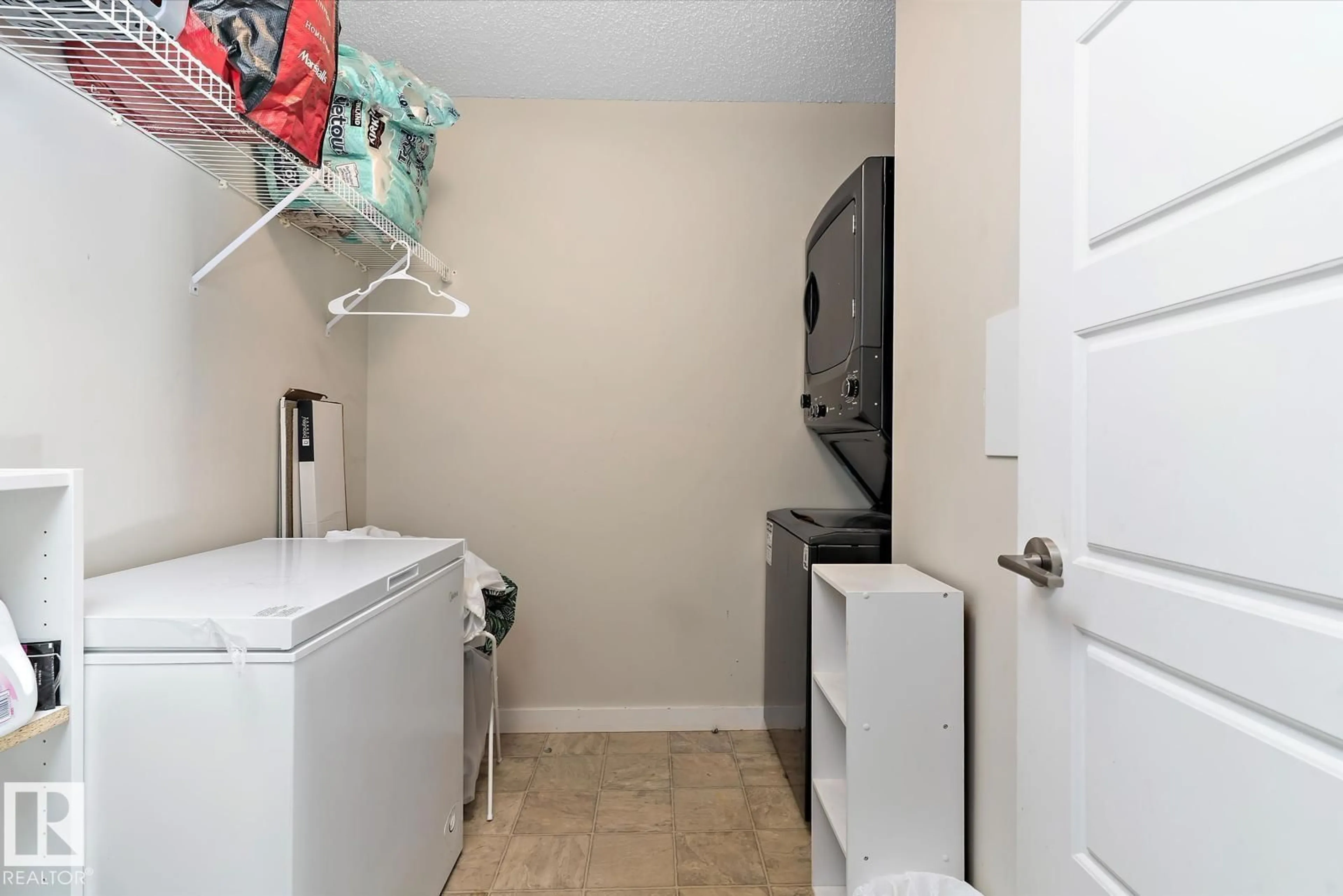 Laundry room for #110 - 14808 125 ST NW, Edmonton Alberta T5X0G1