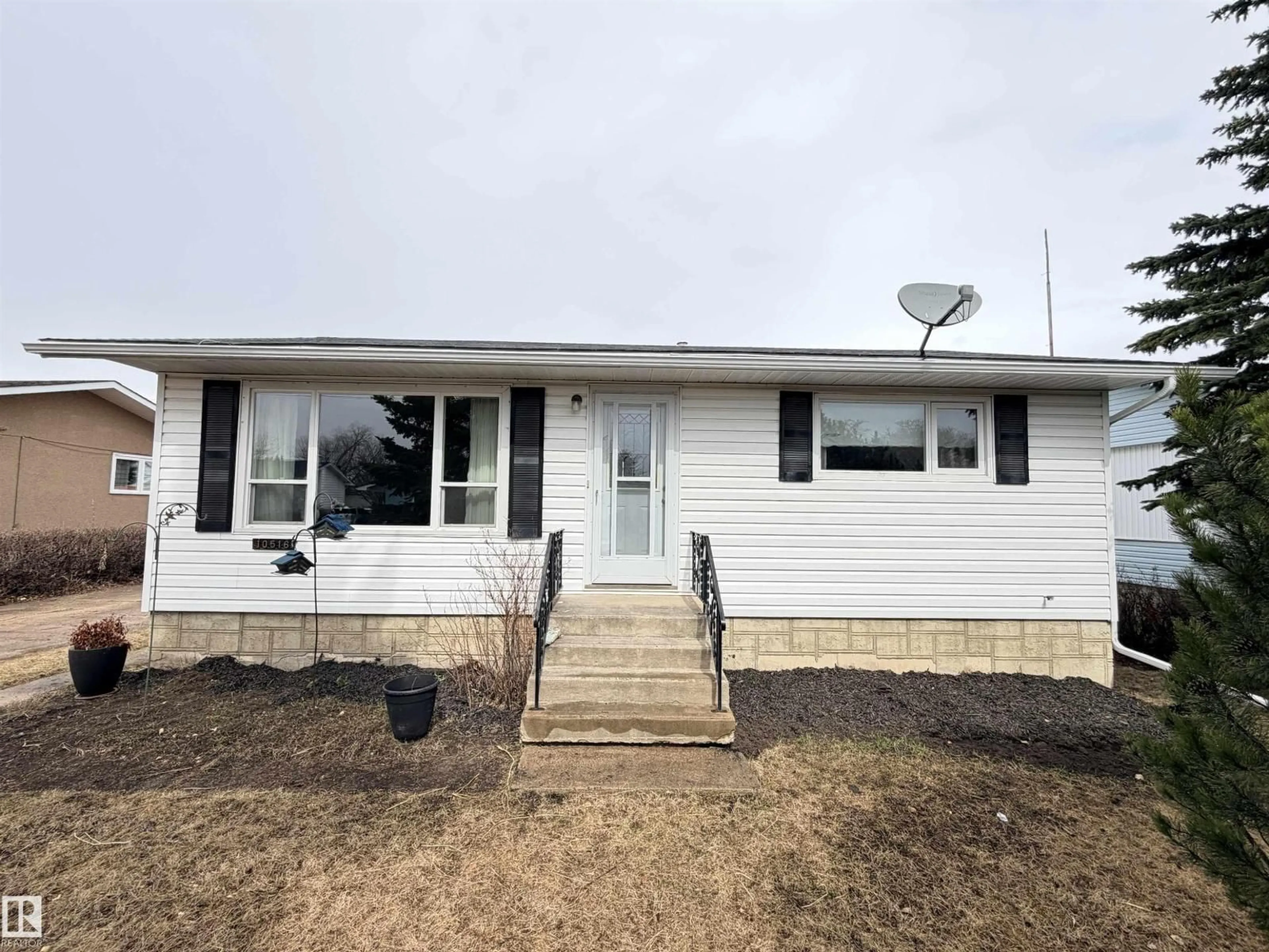 Home with vinyl exterior material, unknown for 10516 104 ST, Westlock Alberta T7P1M1