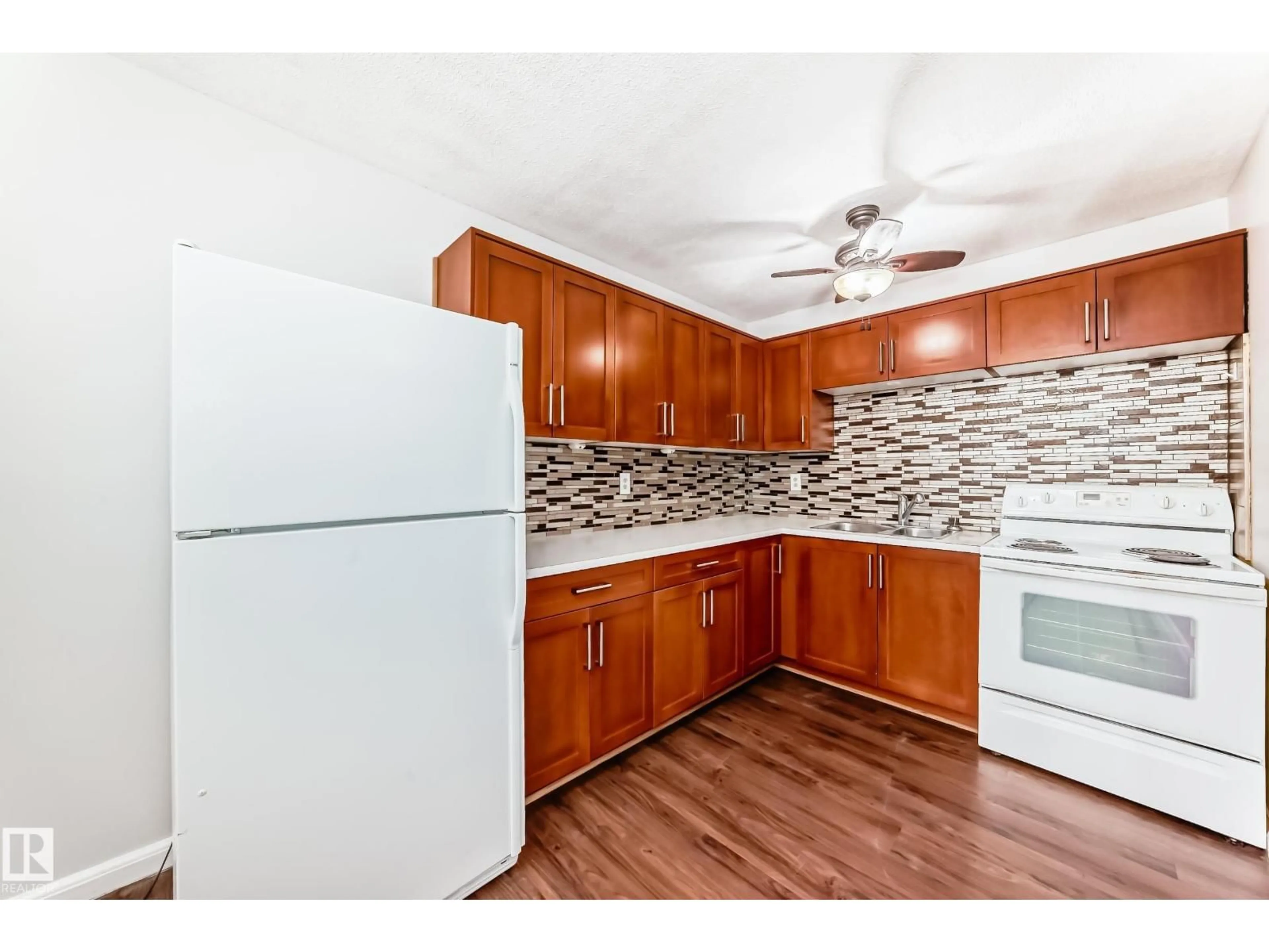 Standard kitchen, wood/laminate floor for 3325 107 AV NW, Edmonton Alberta T5W0C6