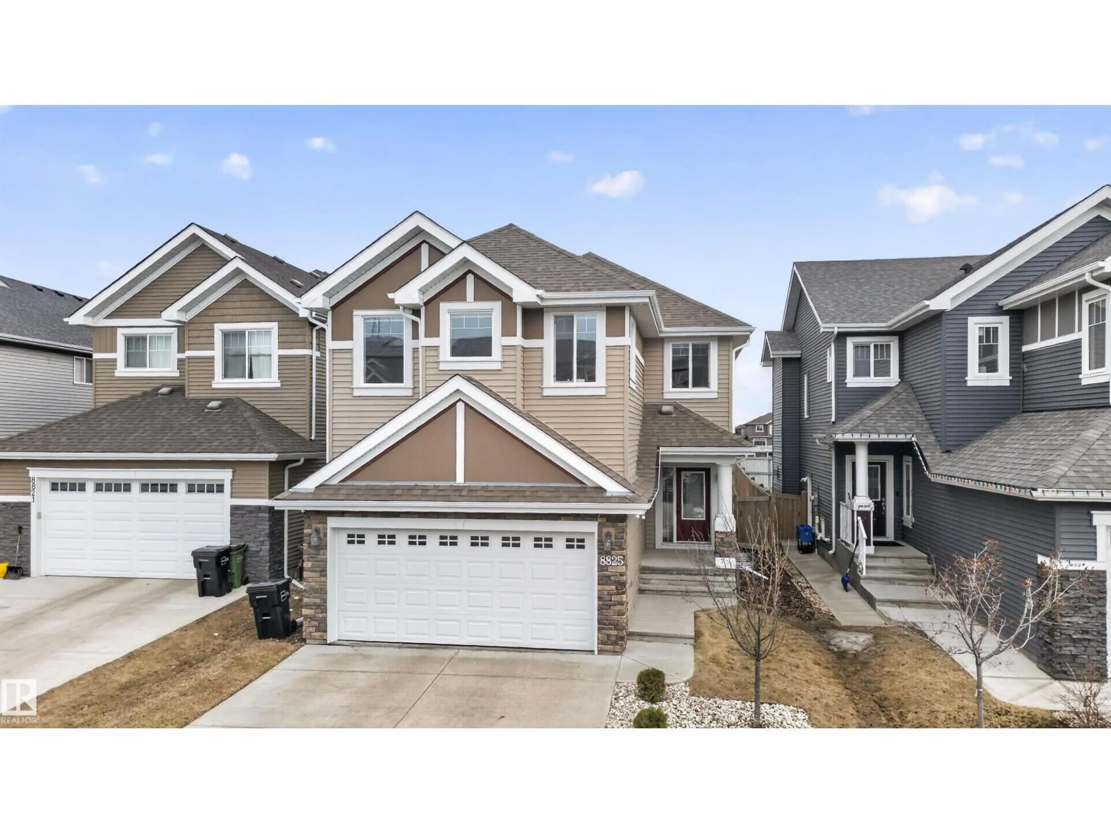 Home with vinyl exterior material, street for 8825 24 AV, Edmonton Alberta T6X2C9