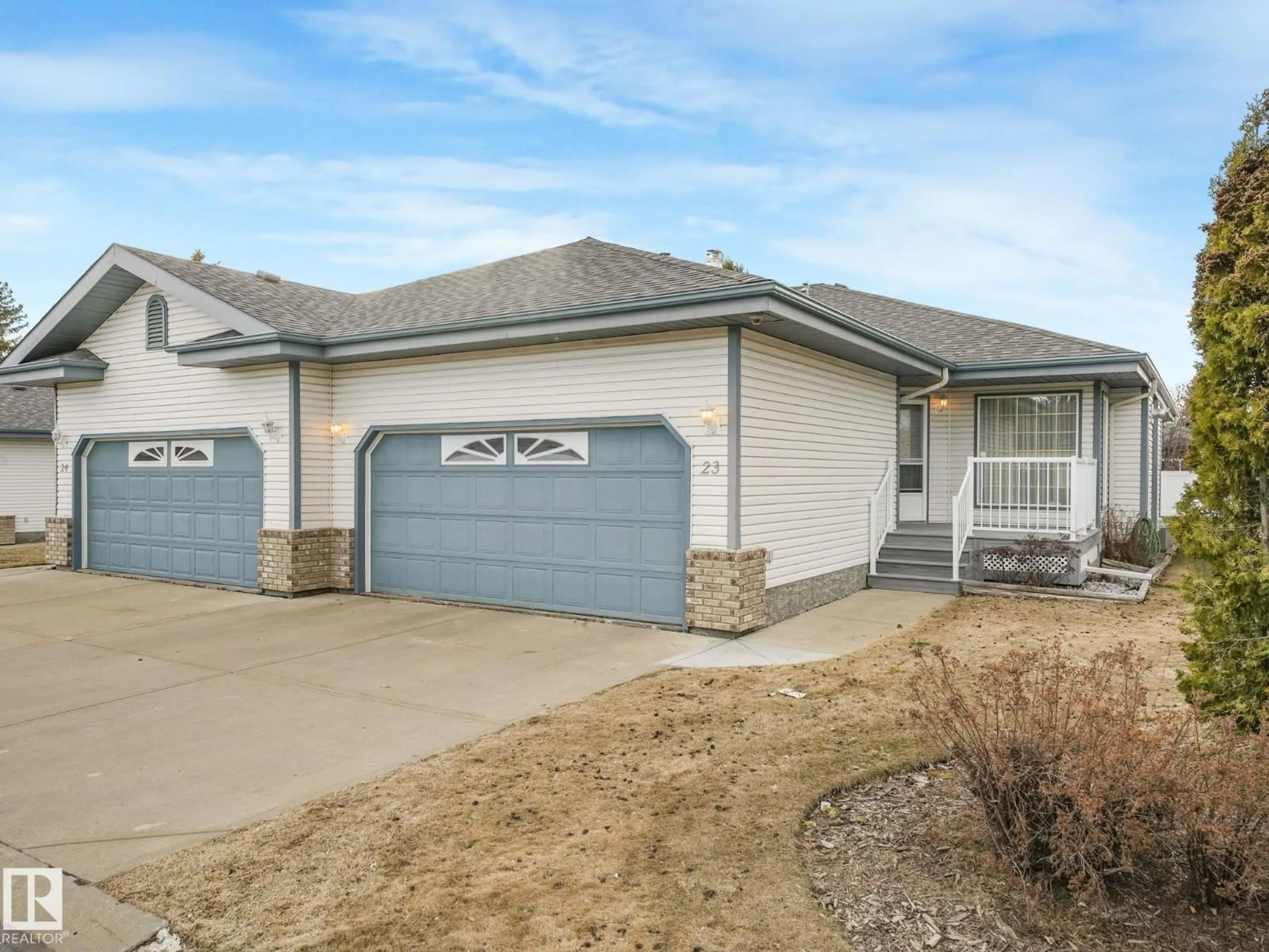 Home with vinyl exterior material, street for #23 - 9731 174 ST, Edmonton Alberta T5T6G4