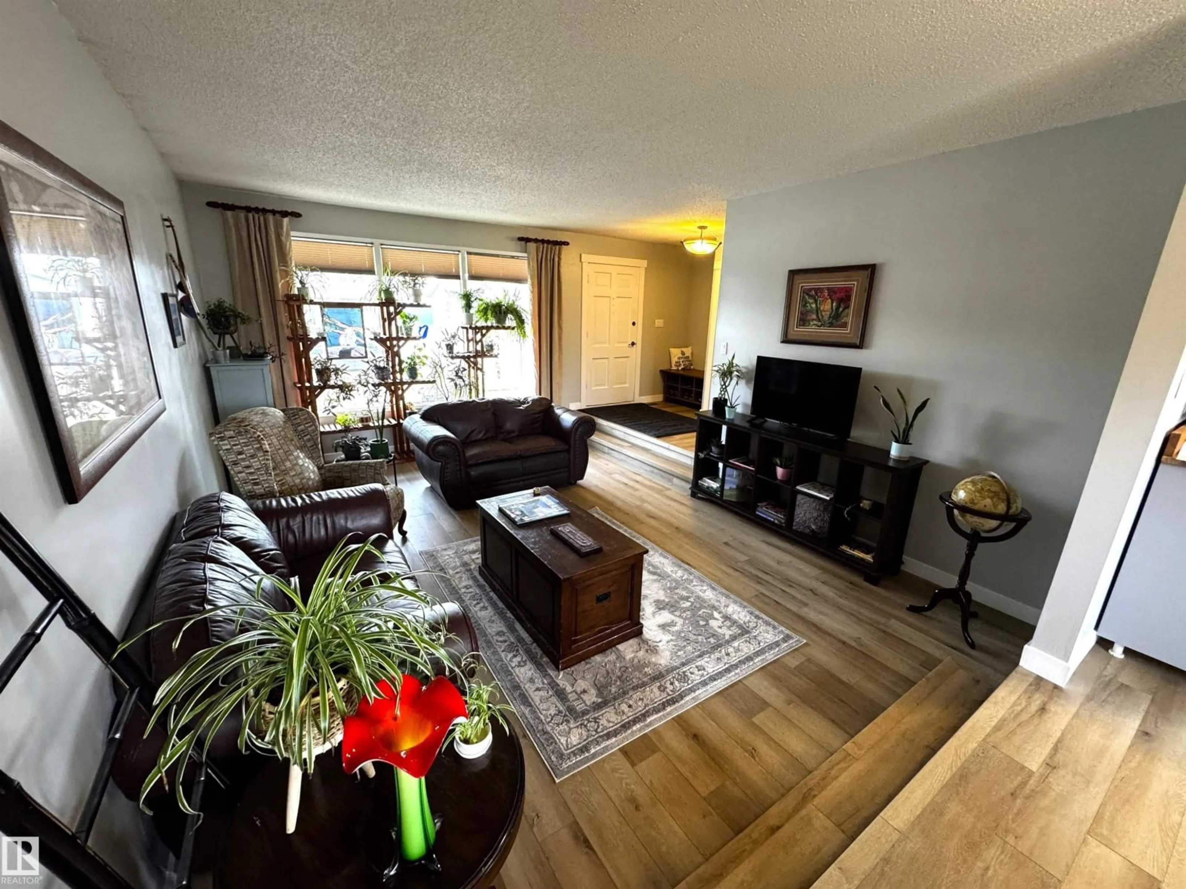 Living room with furniture, wood/laminate floor for 10 MEDHURST CR, Sherwood Park Alberta T8A3T6