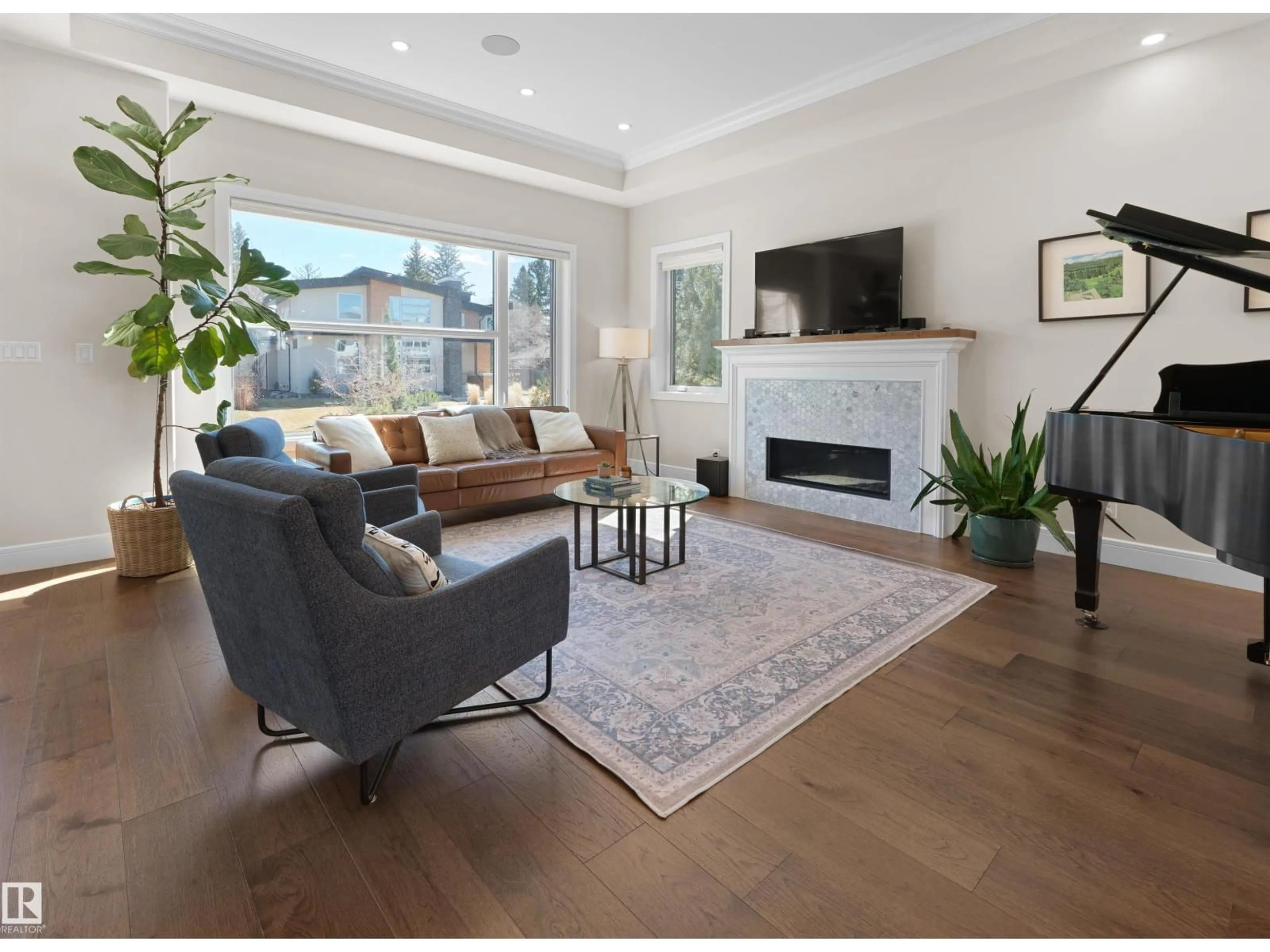 Living room with furniture, wood/laminate floor for 7430 119 ST, Edmonton Alberta T6G1W1