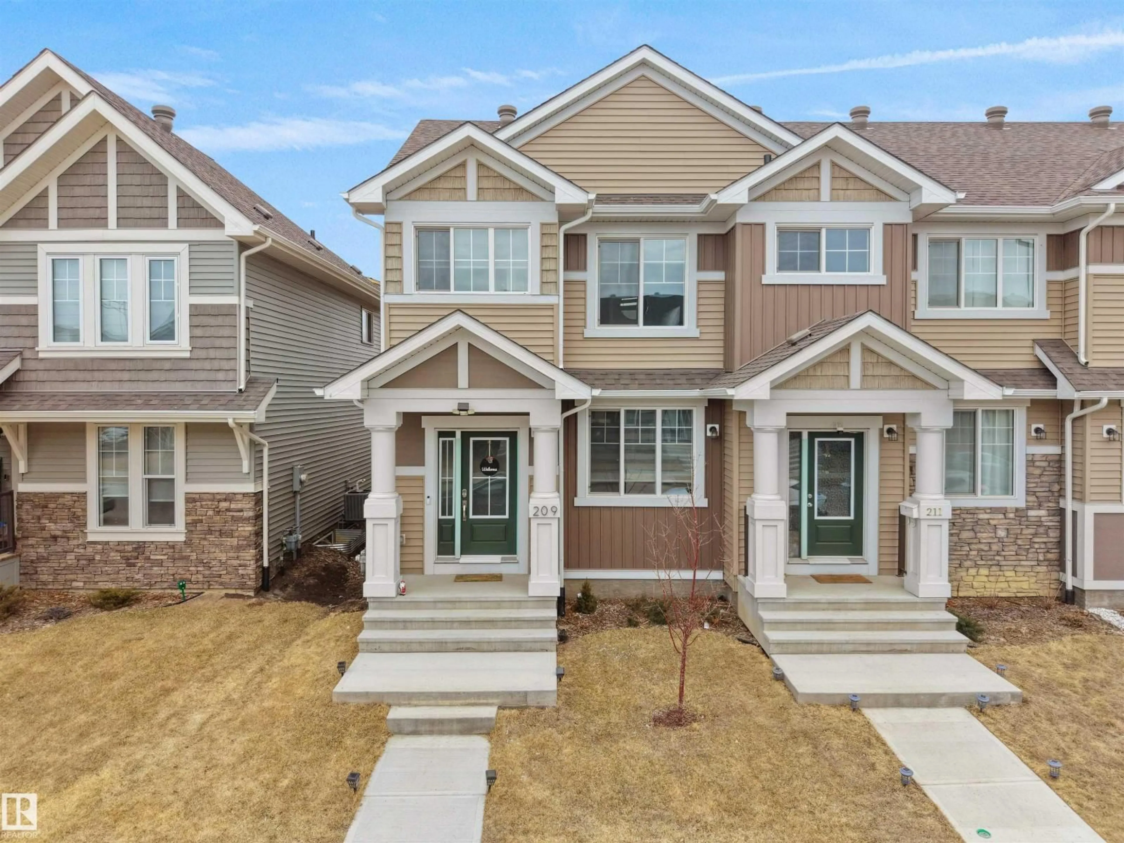 Home with brick exterior material, street for 209 DESROCHERS BV, Edmonton Alberta T6W4N2