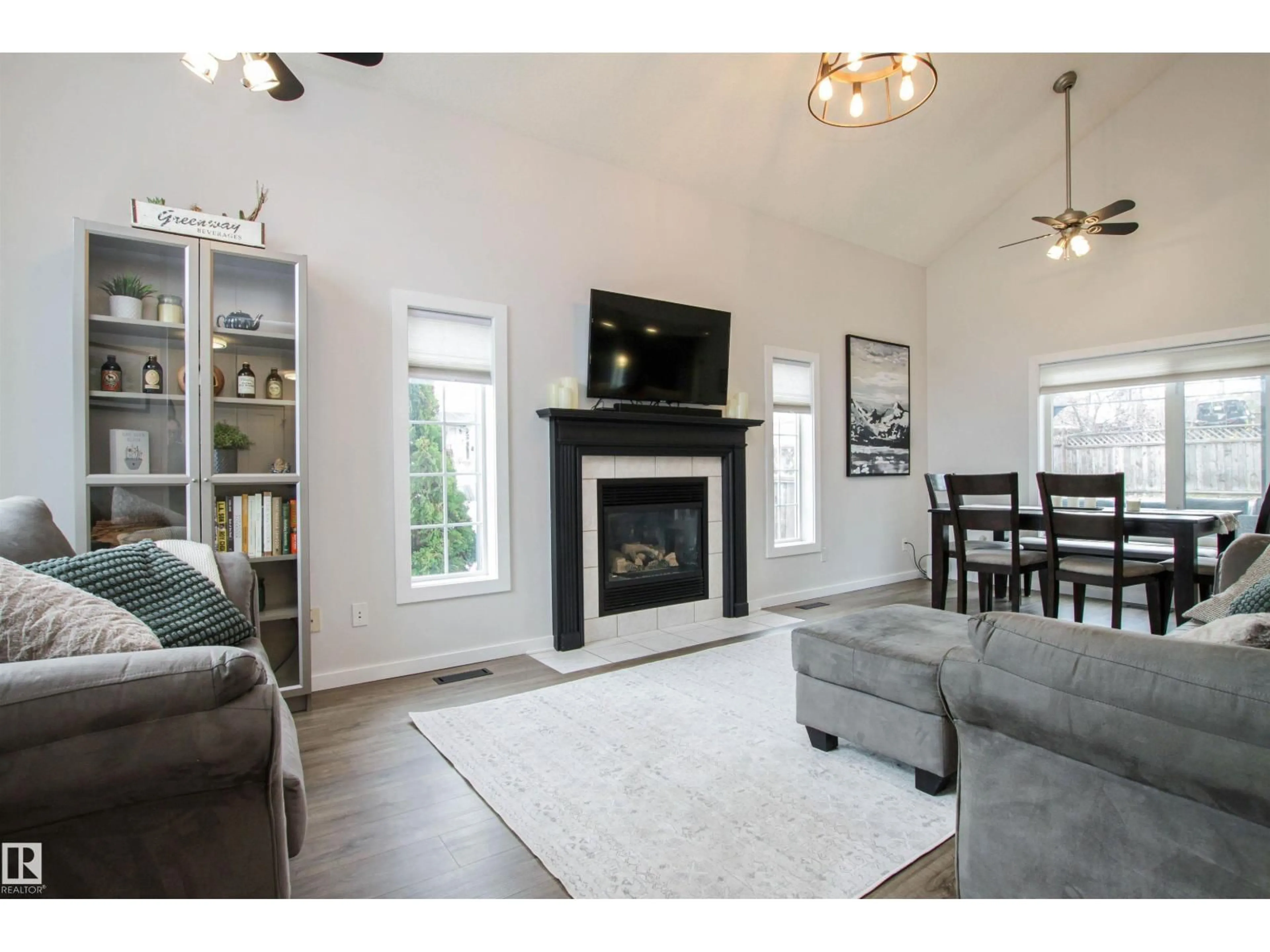 Living room with furniture, wood/laminate floor for 283 LILAC, Sherwood Park Alberta T8H1Z2