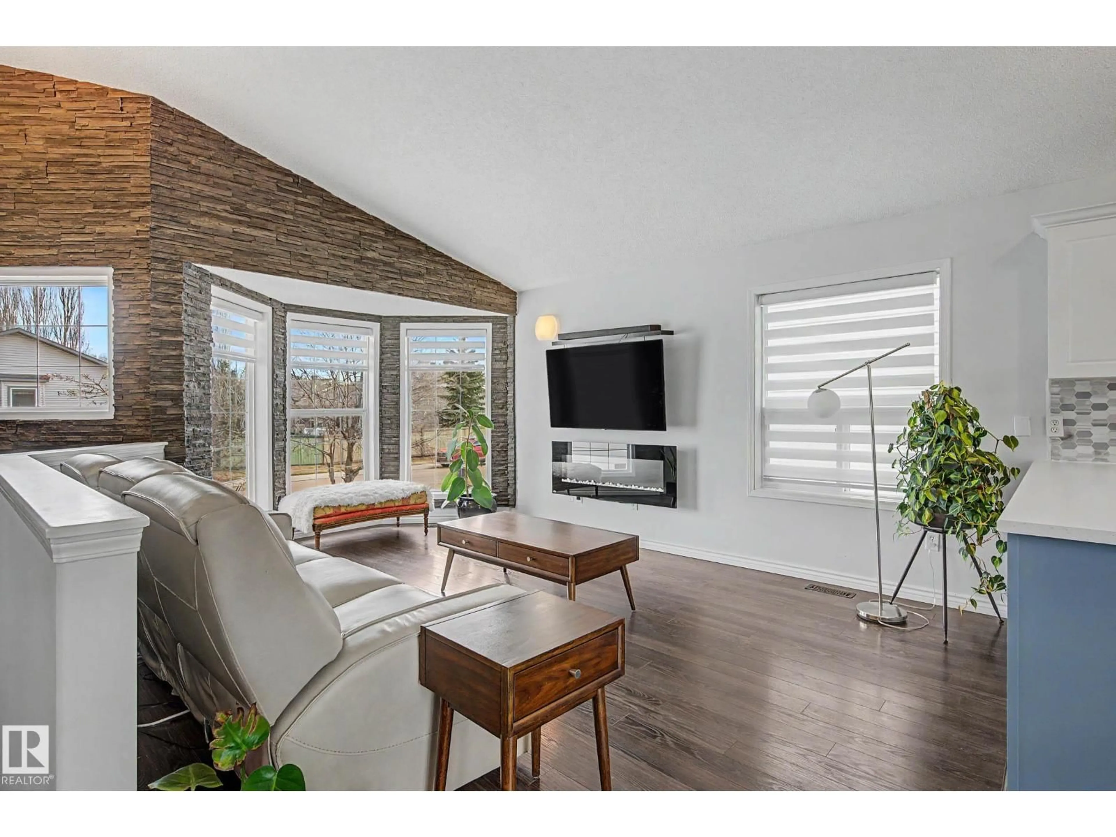 Living room with furniture, wood/laminate floor for 2056 BRENNAN CR, Edmonton Alberta T5T6S4