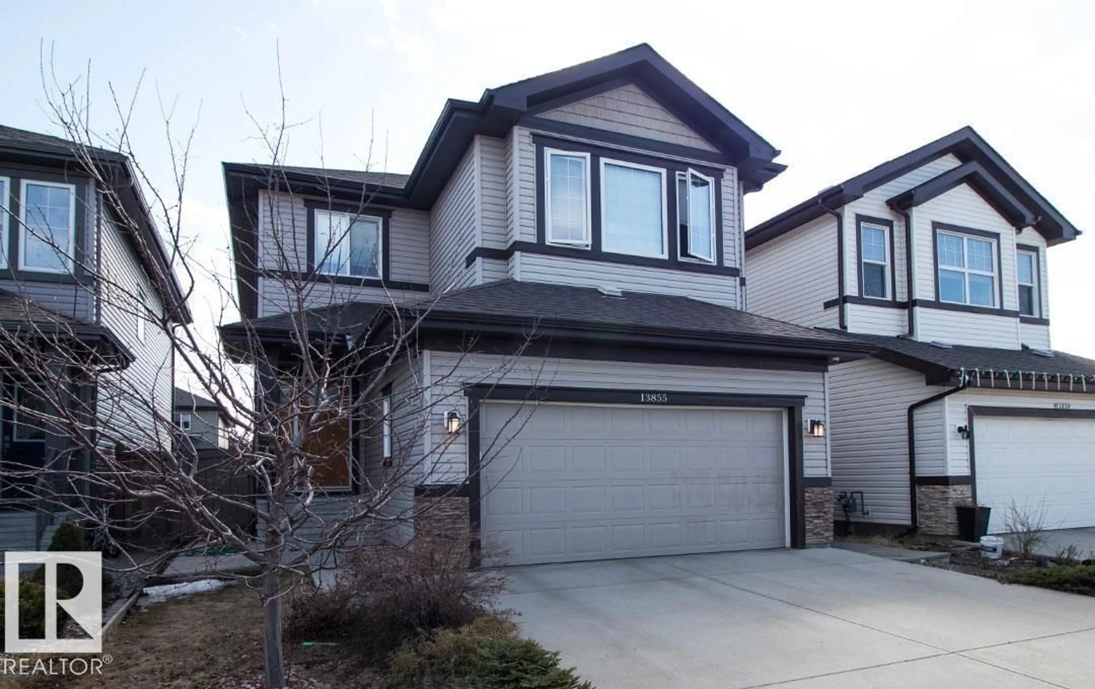 Home with vinyl exterior material, street for NW - 13855 143 AV, Edmonton Alberta T6V0L7