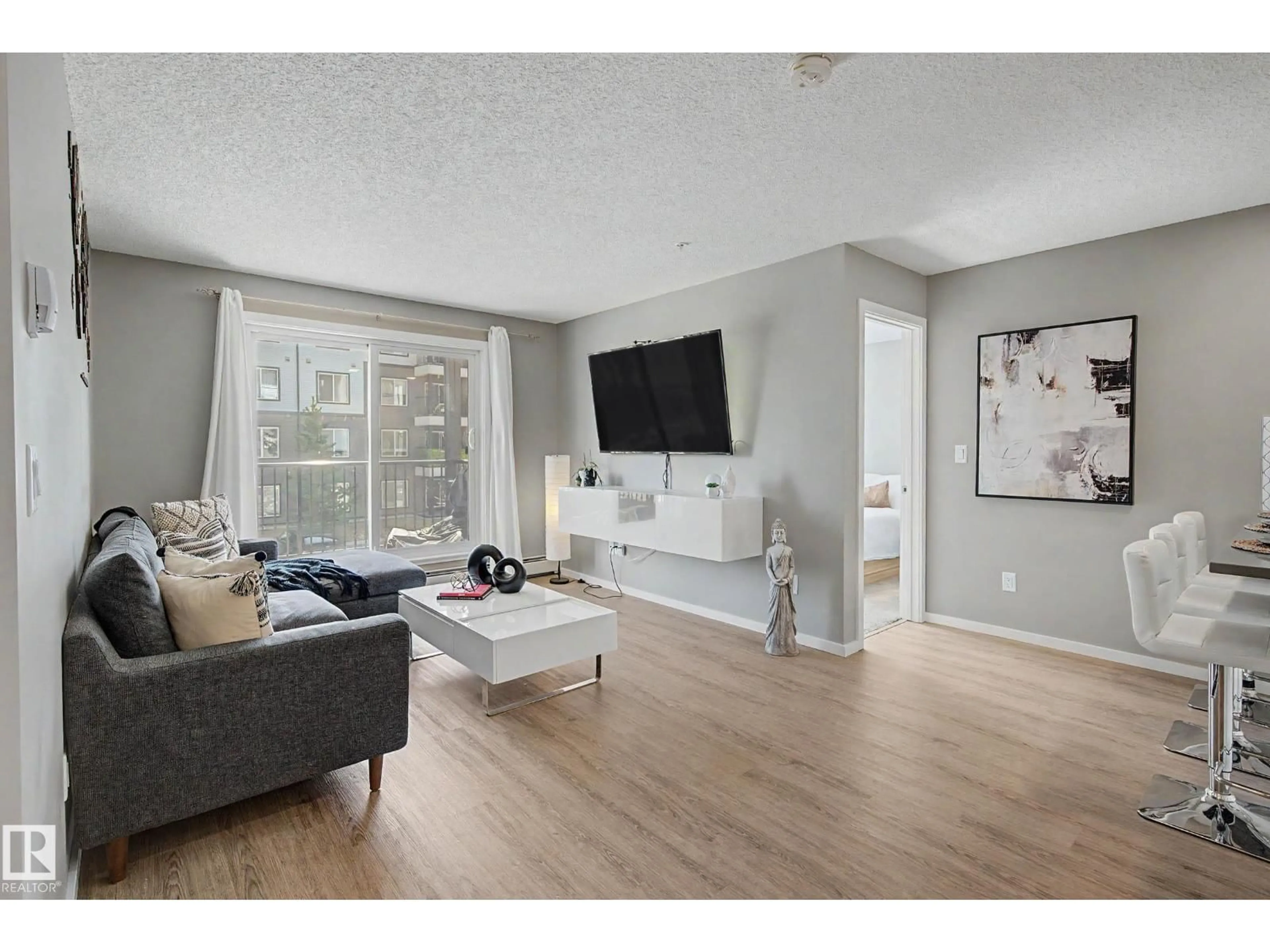 Living room with furniture, unknown for 217 - 394 WINDERMERE RD, Edmonton Alberta T6W0R1