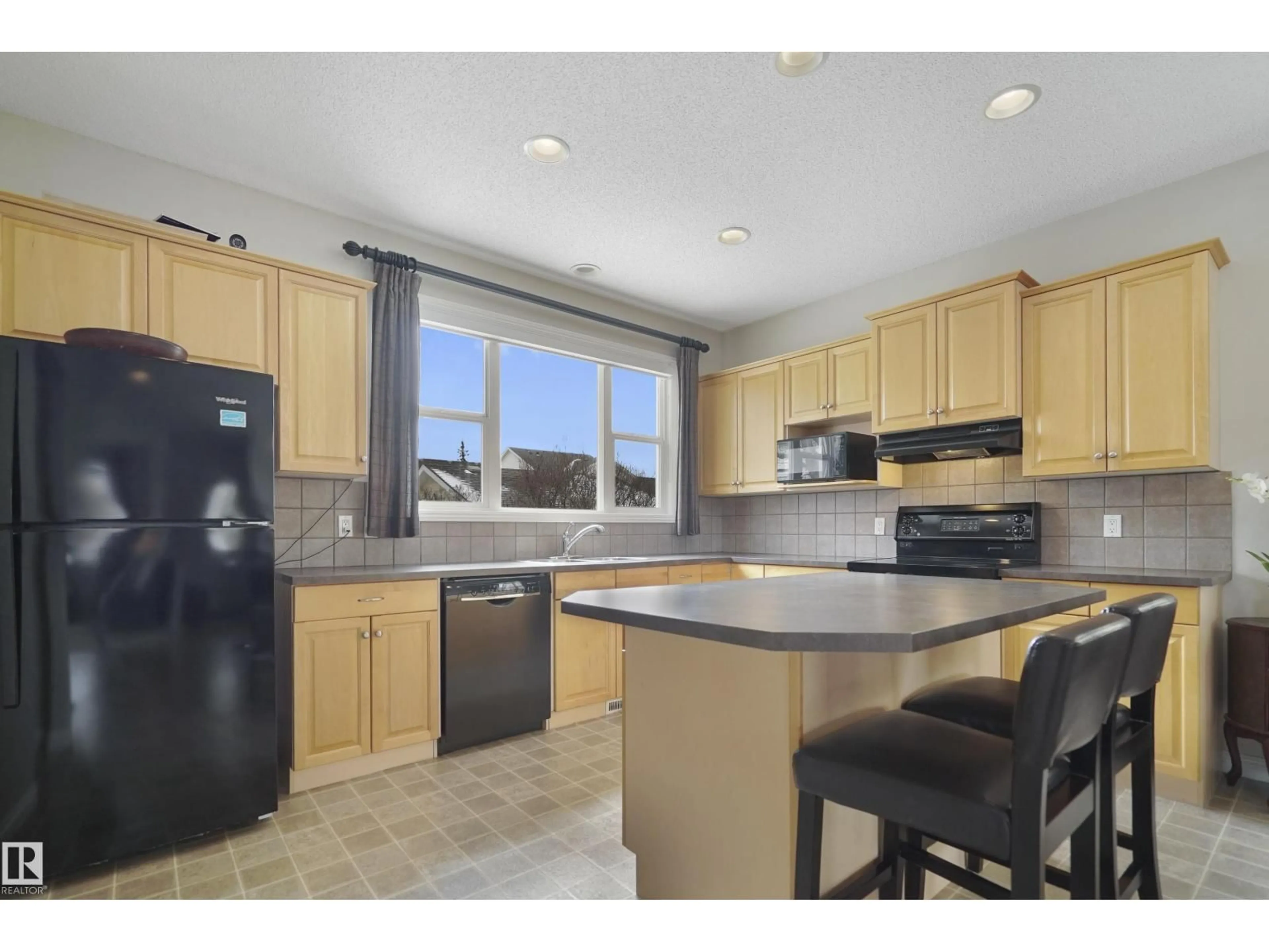 Open concept kitchen, ceramic/tile floor for 103 GRIESBACH RD, Edmonton Alberta T5E6L8