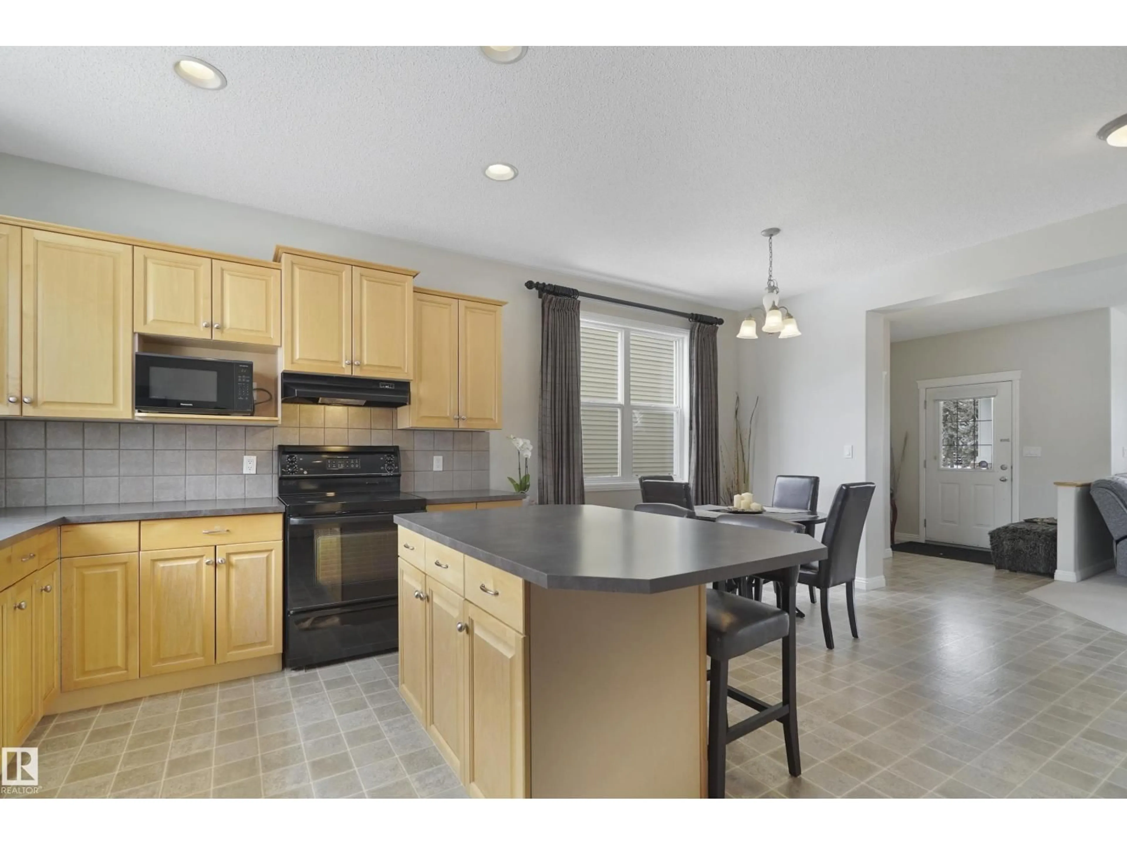Open concept kitchen, ceramic/tile floor for 103 GRIESBACH RD, Edmonton Alberta T5E6L8