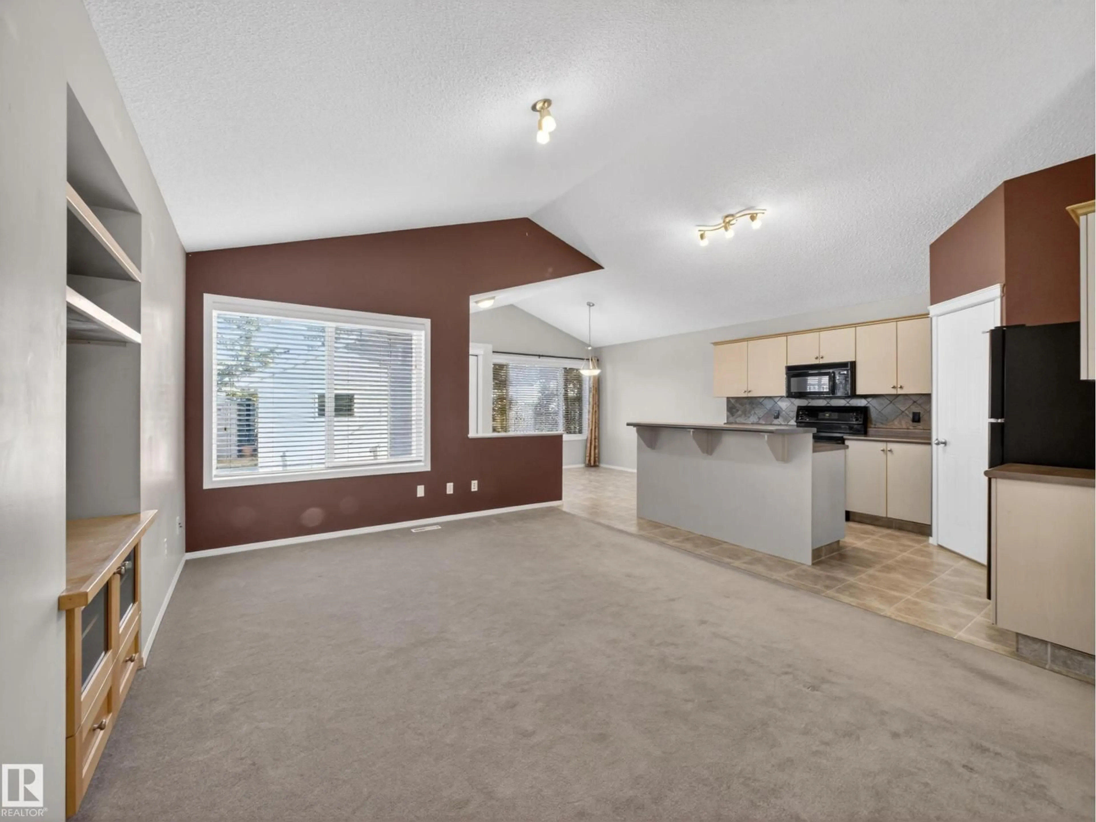 Open concept kitchen, unknown for 7912 10 AV, Edmonton Alberta T6X1E7