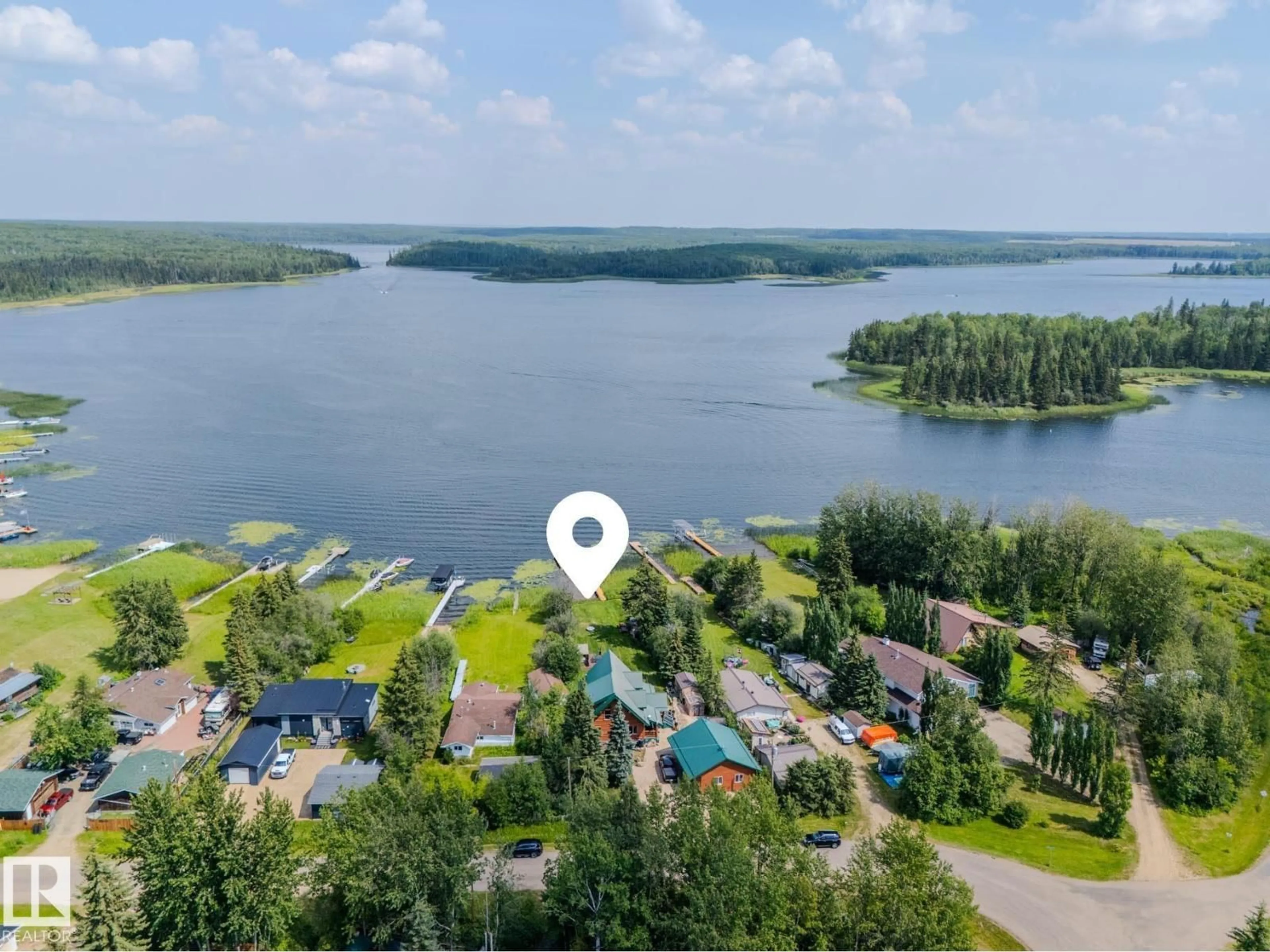 A pic from outside/outdoor area/front of a property/back of a property/a pic from drone, water/lake/river/ocean view for 213 LAKESHORE DR, Rural Athabasca County Alberta T9S1C4