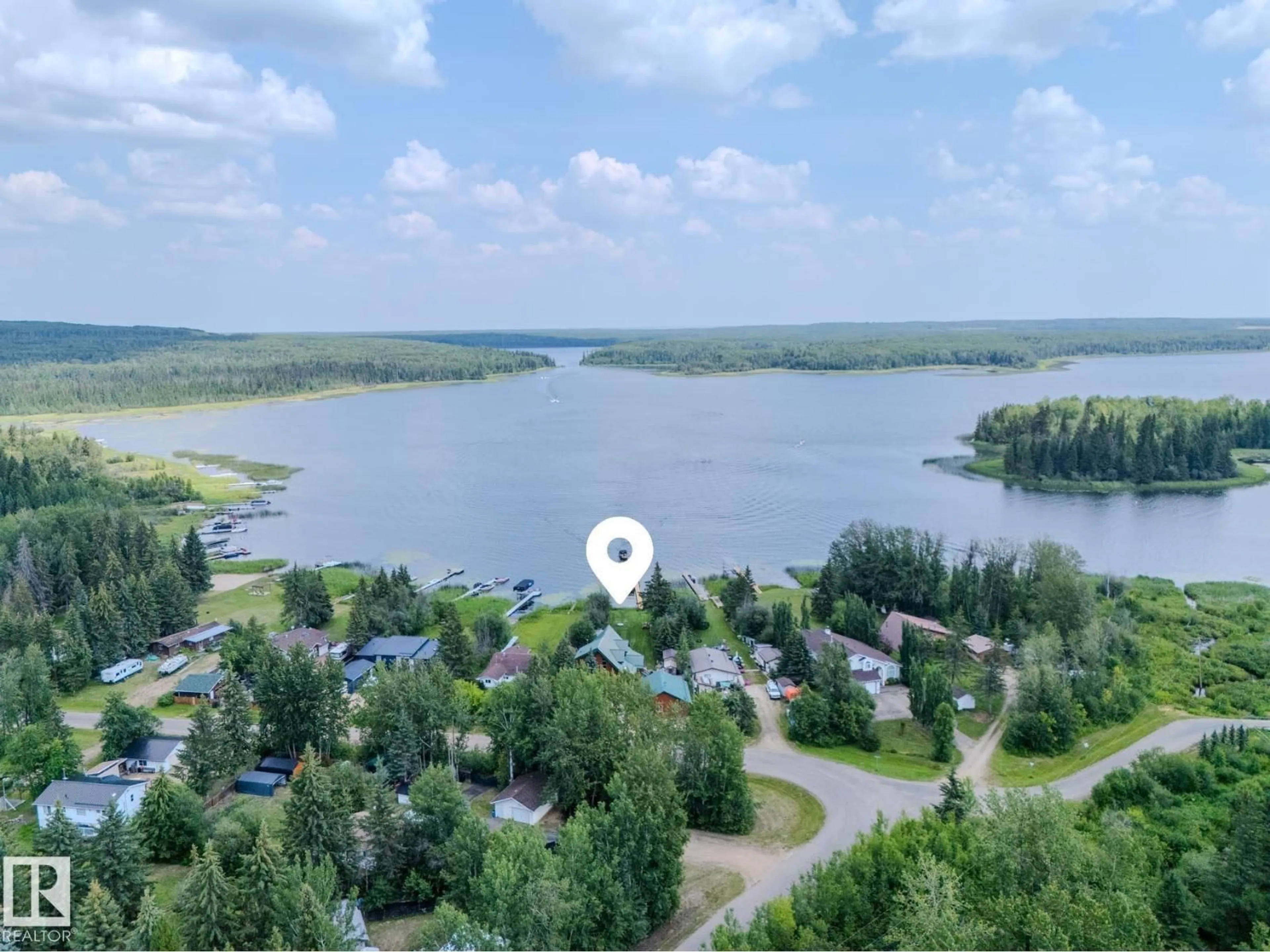 A pic from outside/outdoor area/front of a property/back of a property/a pic from drone, water/lake/river/ocean view for 213 LAKESHORE DR, Rural Athabasca County Alberta T9S1C4