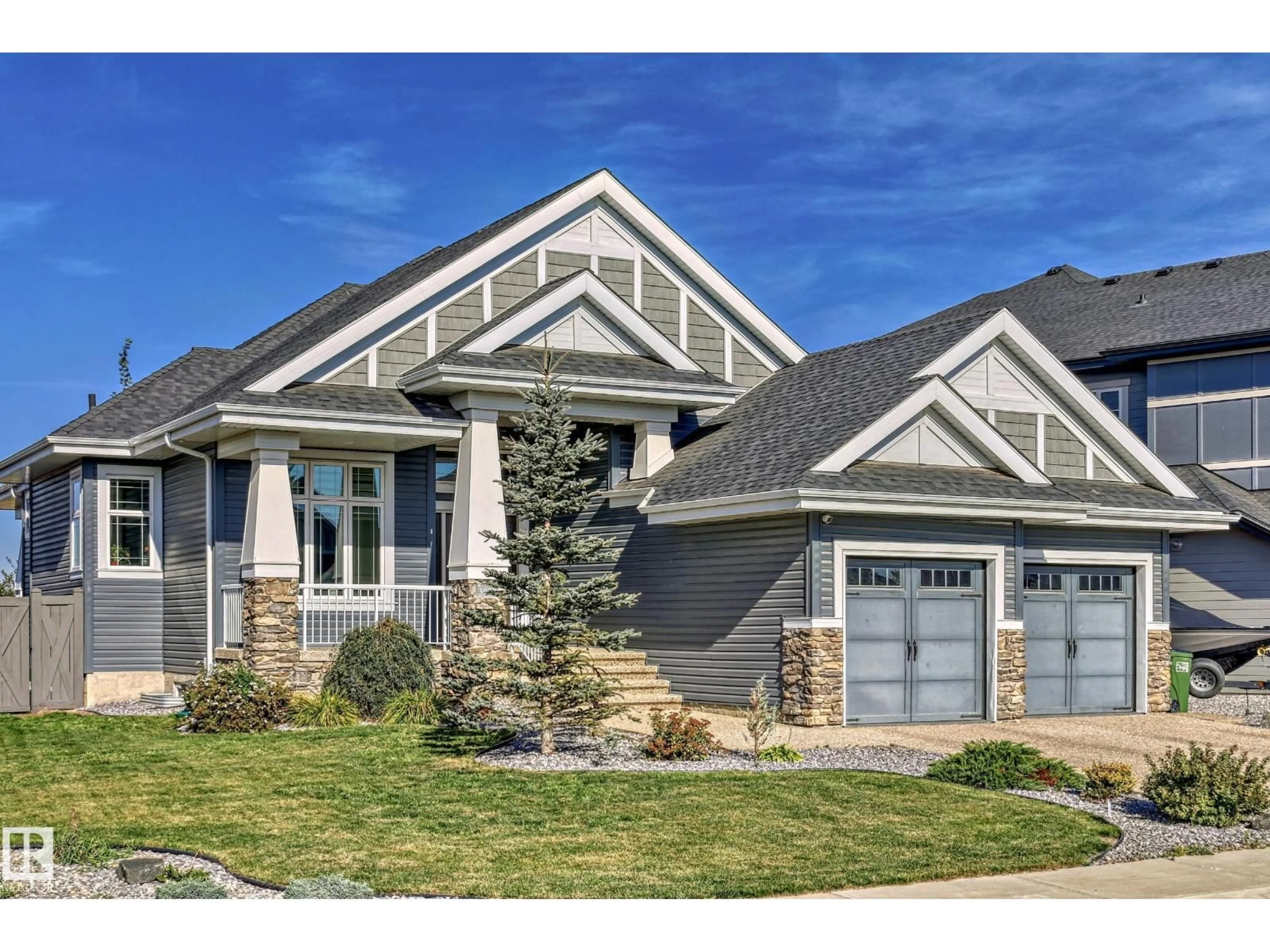 Home with vinyl exterior material, street for NW - 3908 GINSBURG CR, Edmonton Alberta T5T4V2