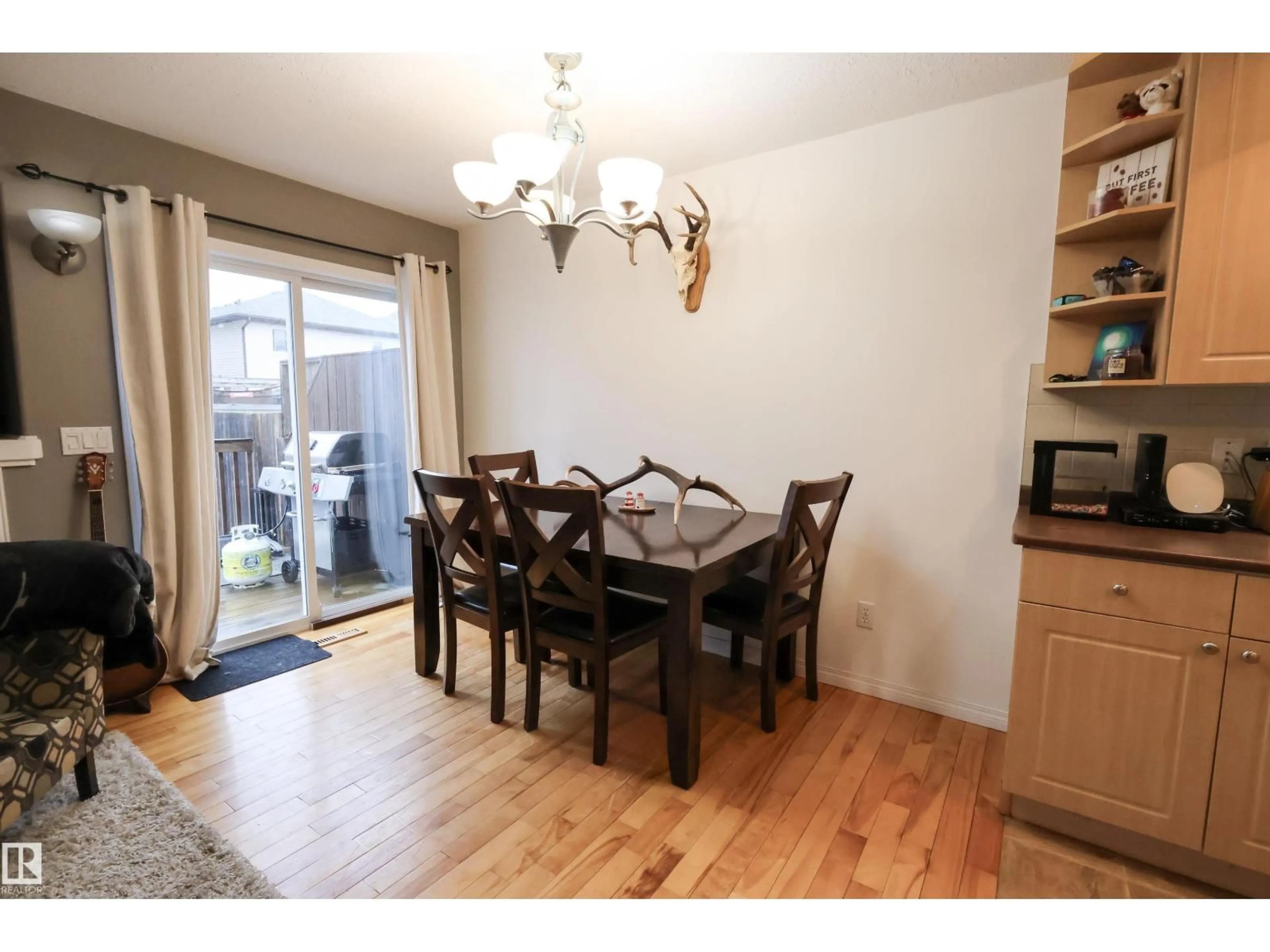 Dining room, wood/laminate floor for 9913 102, Morinville Alberta T8R1V9