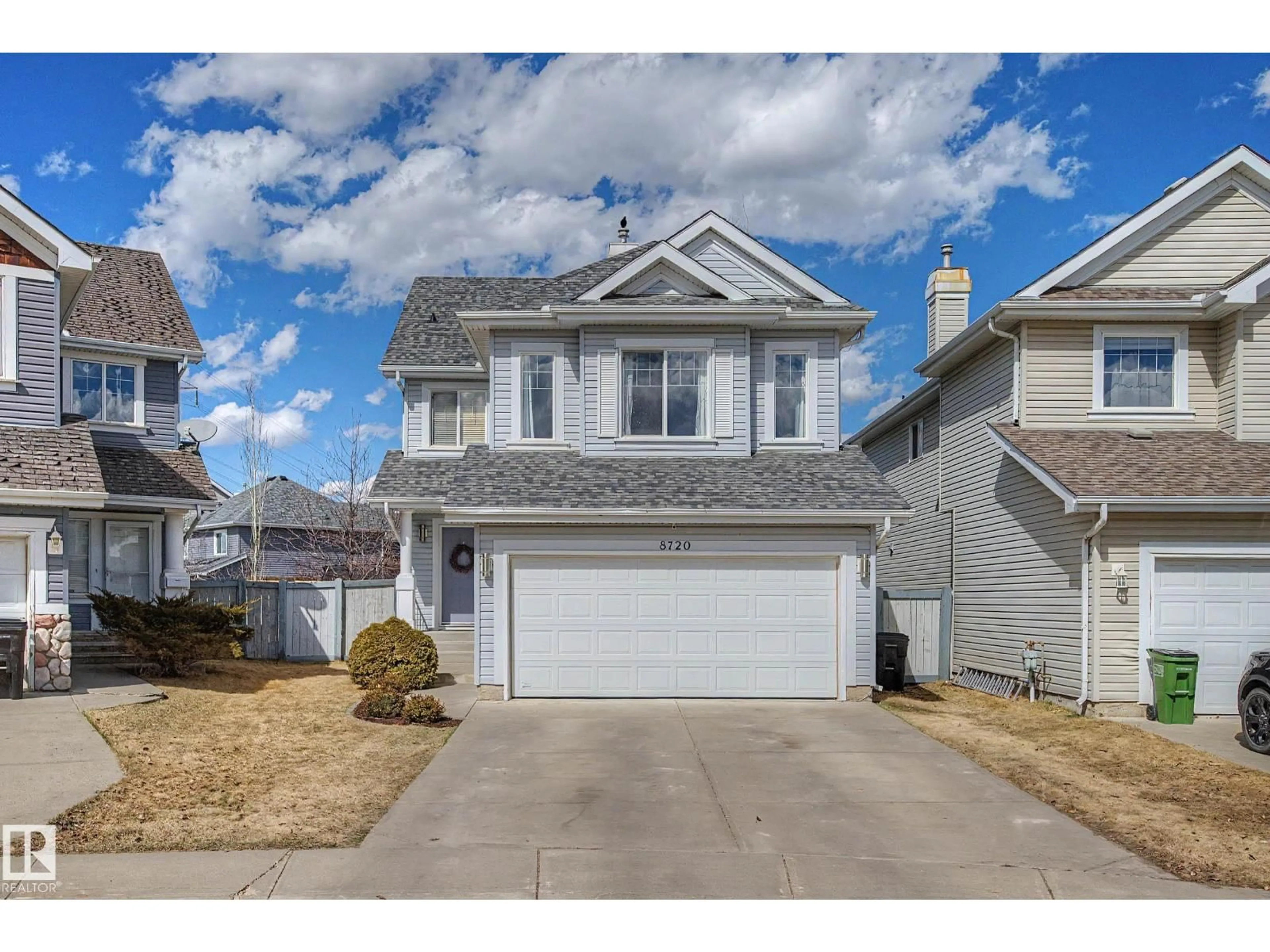 Home with vinyl exterior material, street for SW - 8720 11 AV, Edmonton Alberta T6X1J5