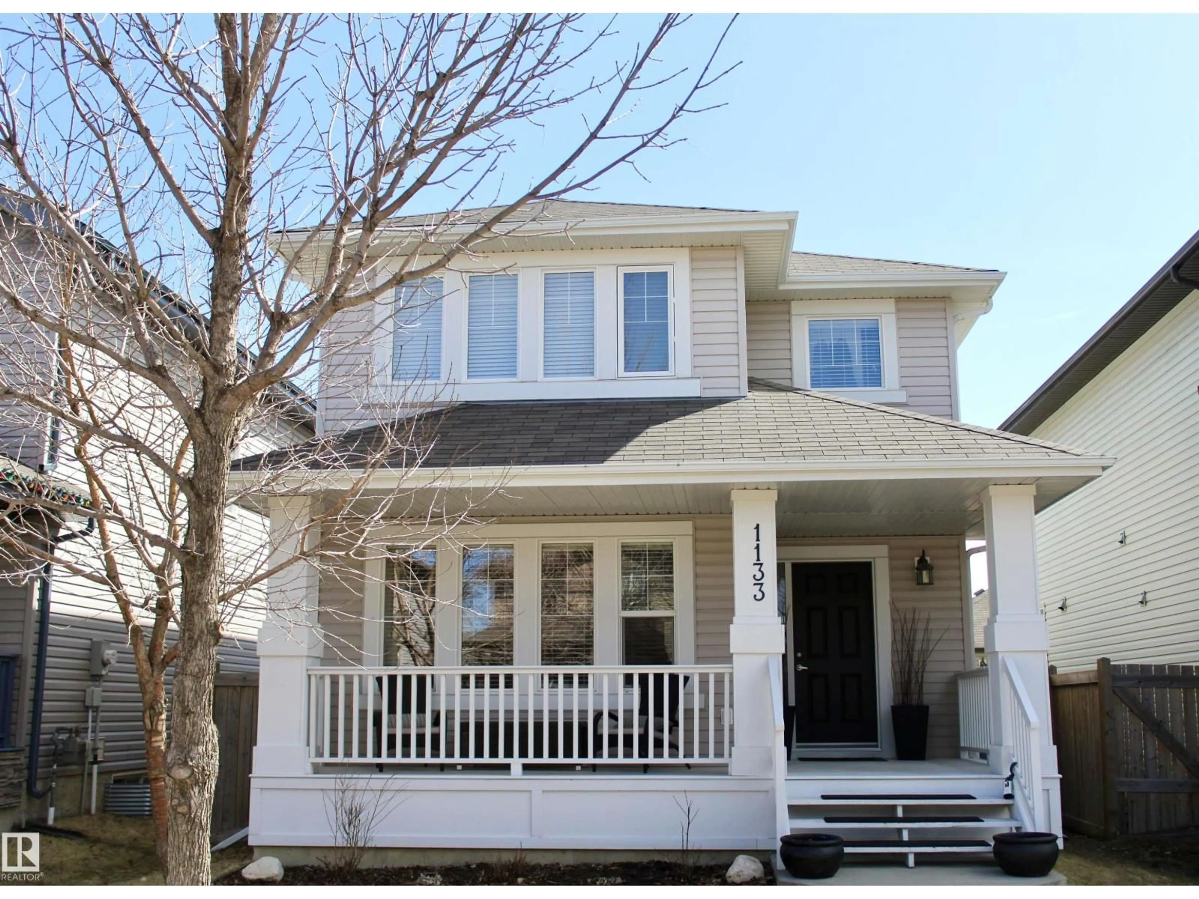 Home with vinyl exterior material, street for 1133 35A AV, Edmonton Alberta T6T0J7