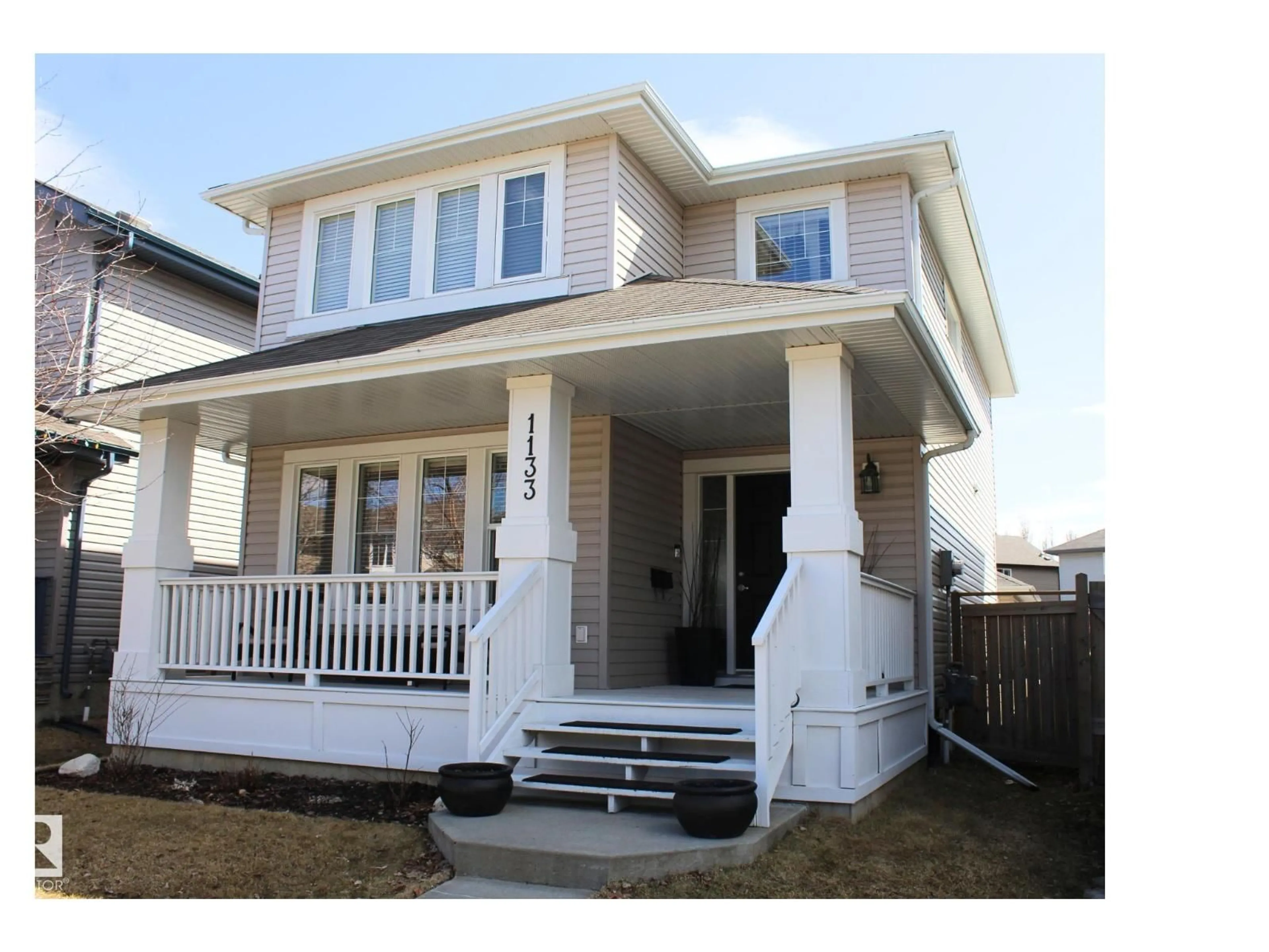 Home with vinyl exterior material, street for 1133 35A AV, Edmonton Alberta T6T0J7
