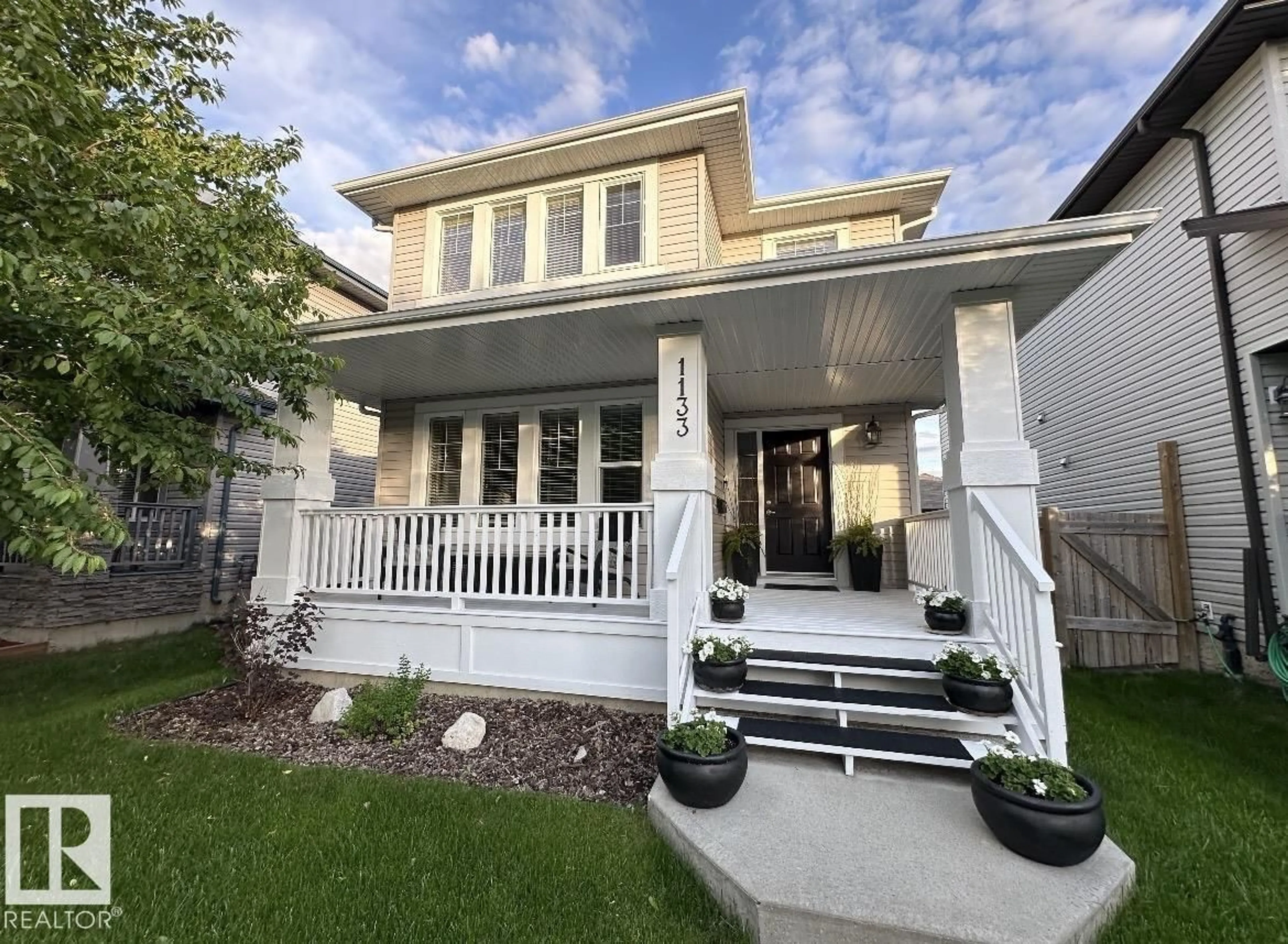 Home with vinyl exterior material, street for 1133 35A AV, Edmonton Alberta T6T0J7