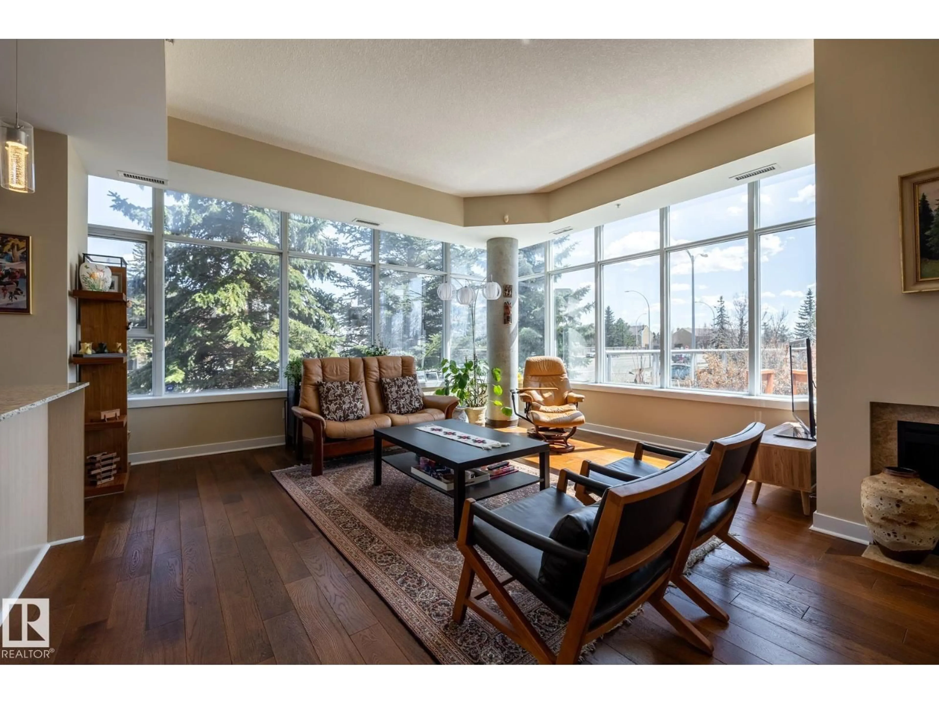 Living room with furniture, wood/laminate floor for S113 - 2504 109 ST, Edmonton Alberta T6T2H3