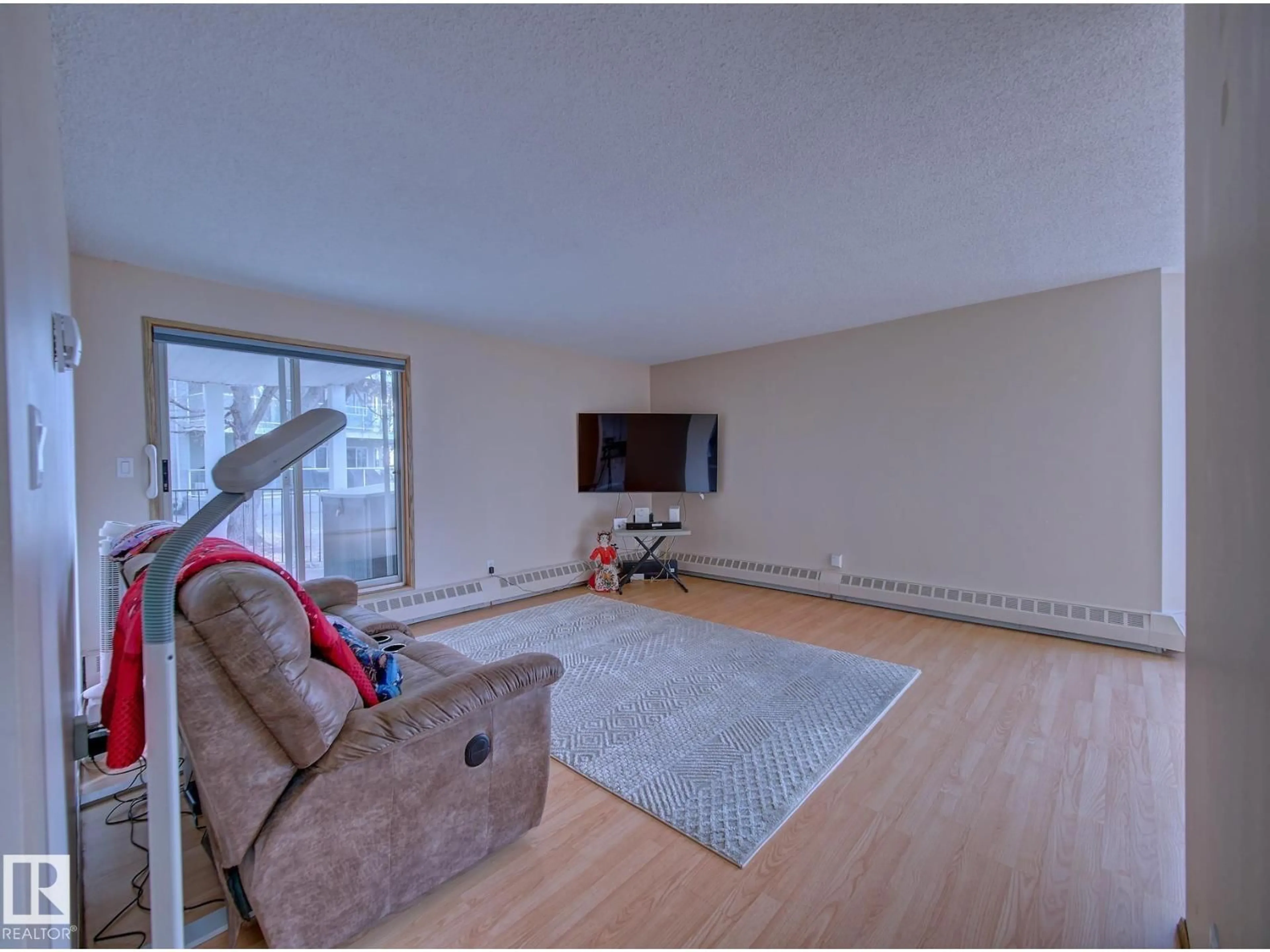 Living room with furniture, unknown for 109 - 9985 93 AV, Fort Saskatchewan Alberta T8L1N5