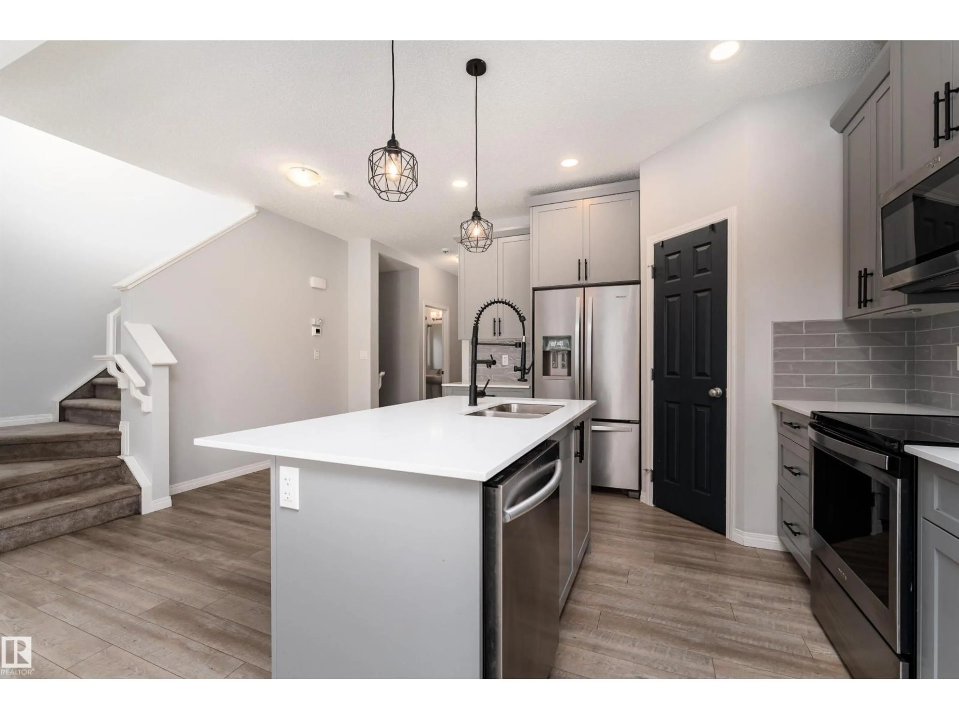 Open concept kitchen, unknown for SW - 6484 KING WD, Edmonton Alberta T6W3Z9