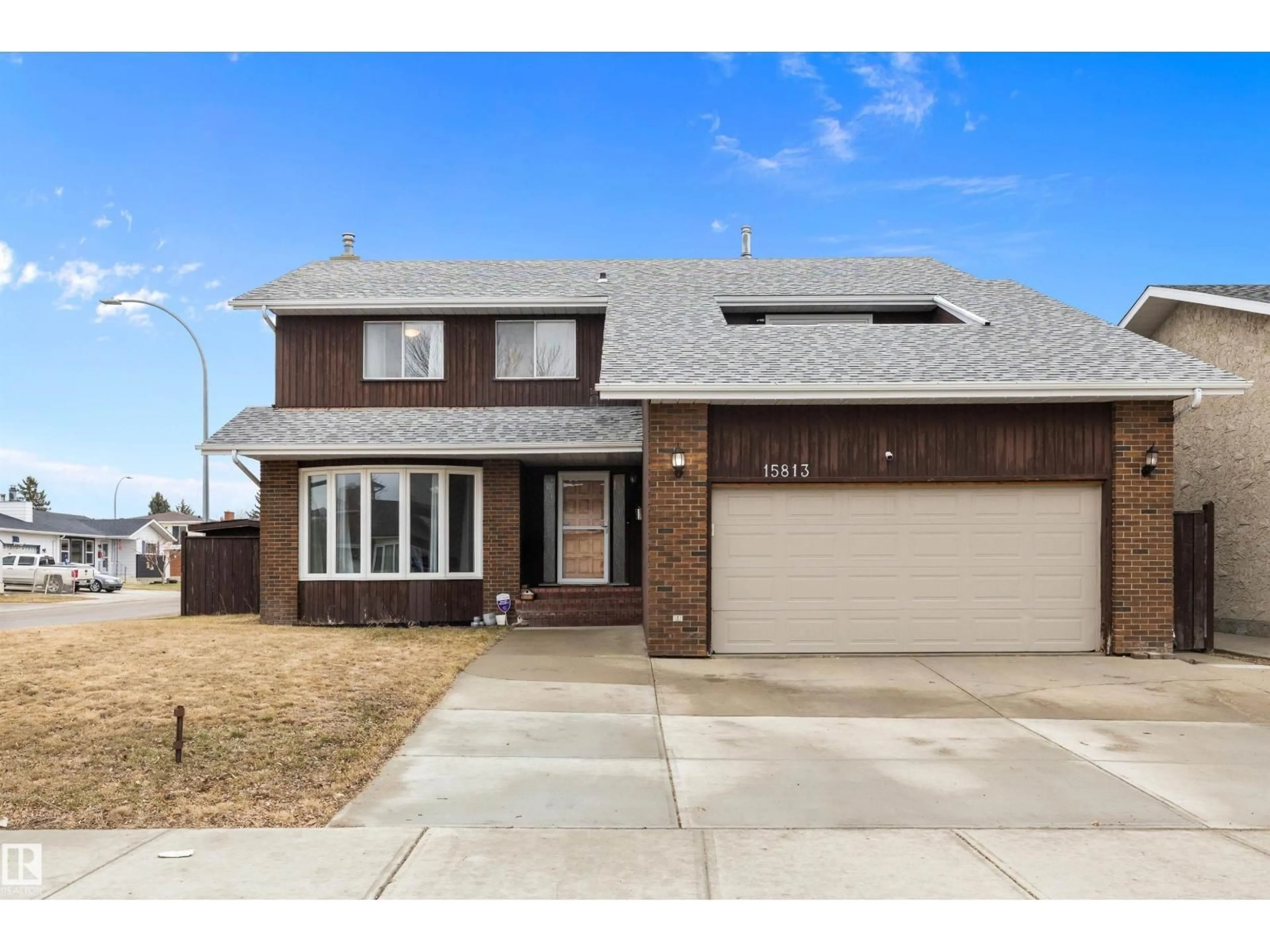 Home with brick exterior material, street for NW - 15813 100 ST, Edmonton Alberta T5X4E2