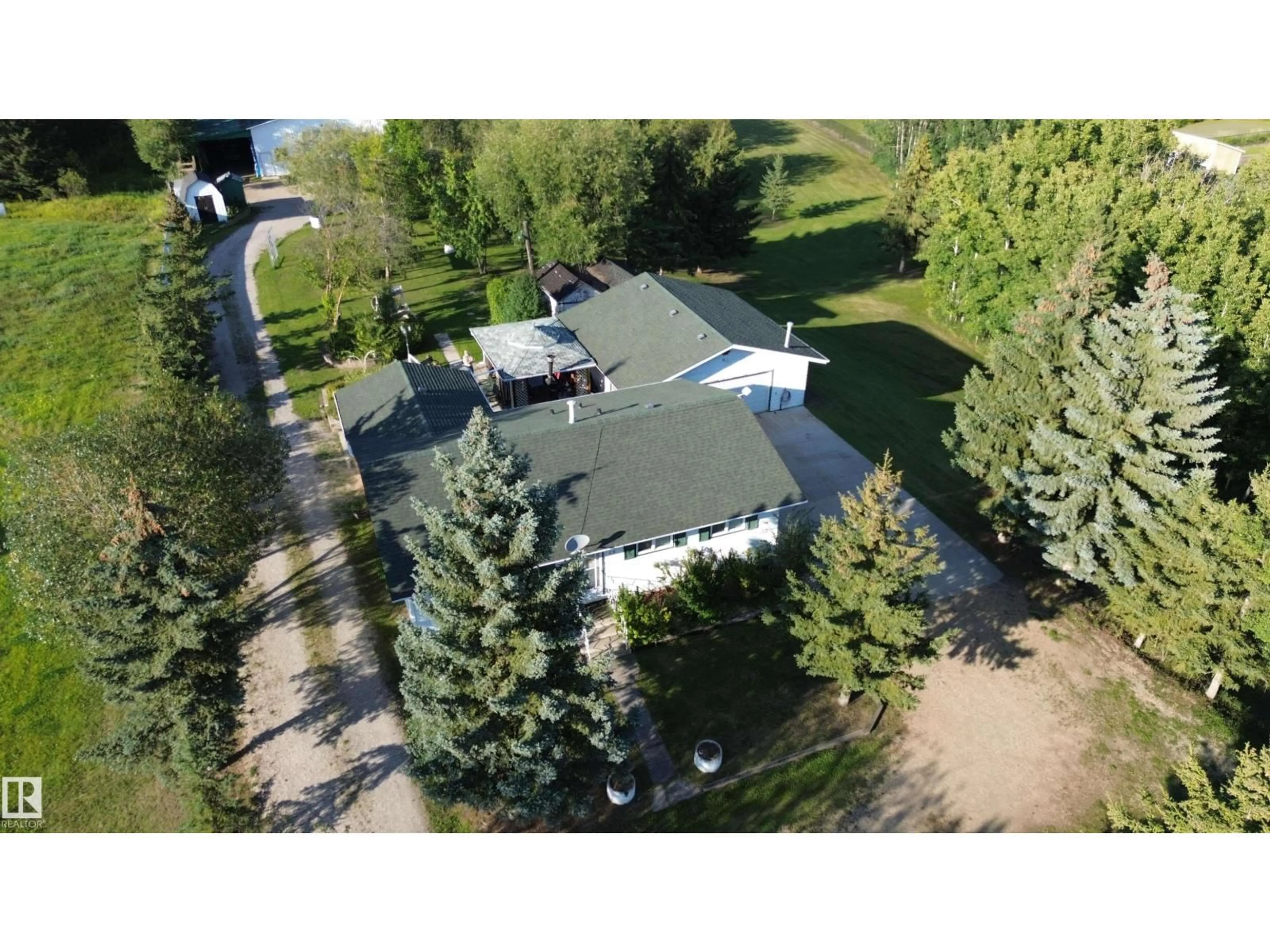 A pic from outside/outdoor area/front of a property/back of a property/a pic from drone, unknown for 14 53348 RGE ROAD 211, Rural Strathcona County Alberta T0B0E0