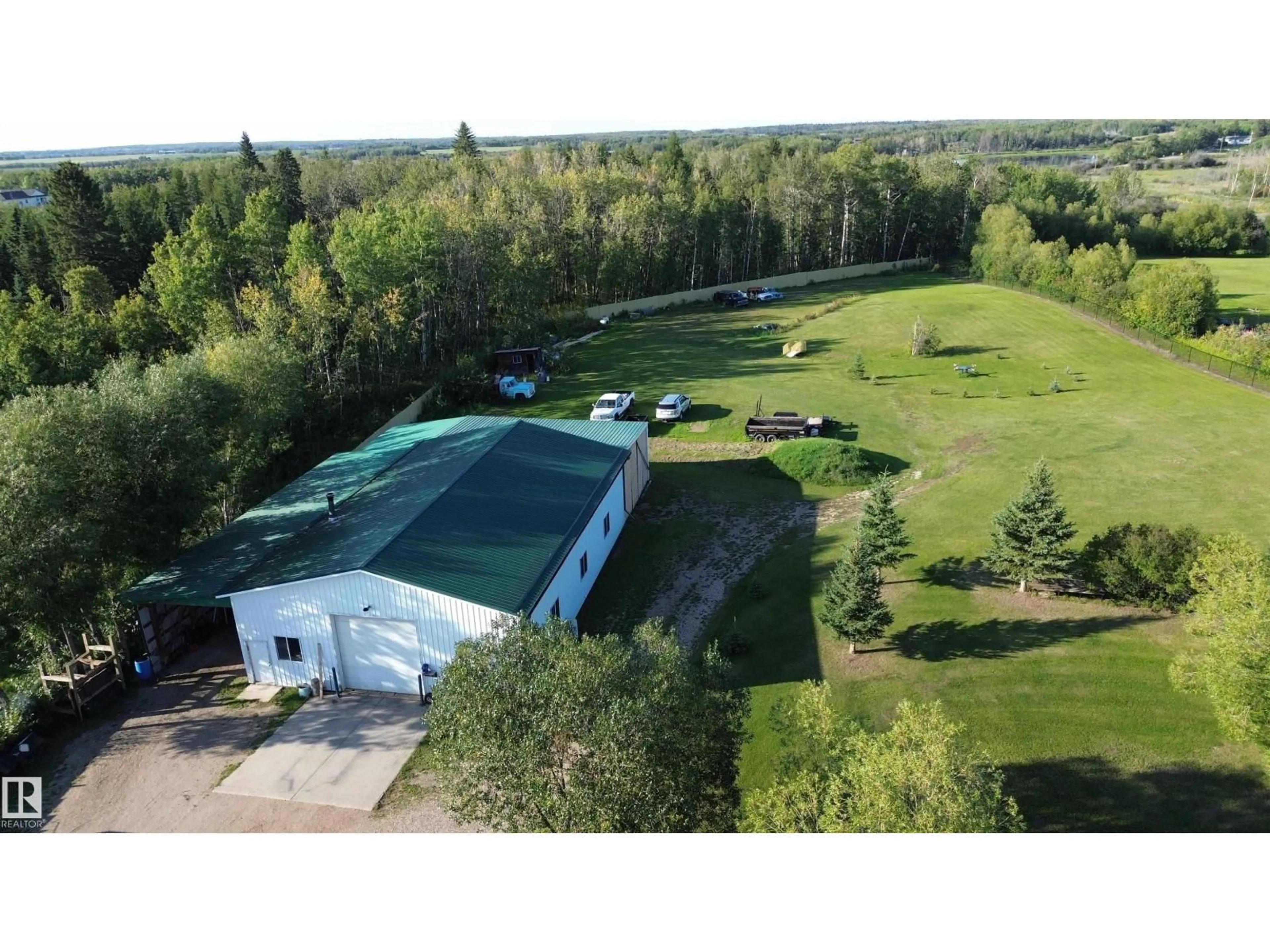 A pic from outside/outdoor area/front of a property/back of a property/a pic from drone, building for 14 53348 RGE ROAD 211, Rural Strathcona County Alberta T0B0E0