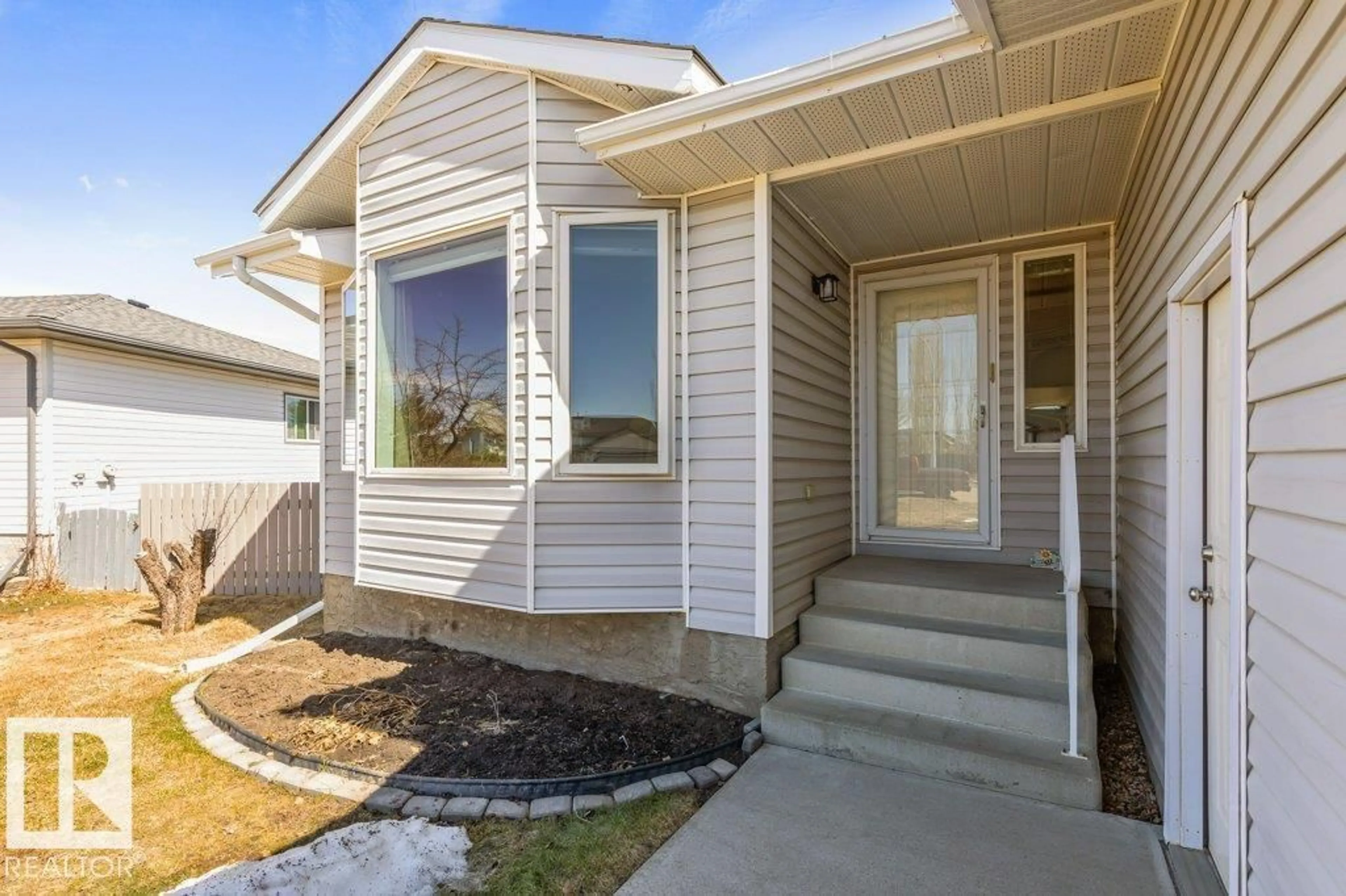 Home with vinyl exterior material, street for 5215 52A ST, Legal Alberta T0G1L0