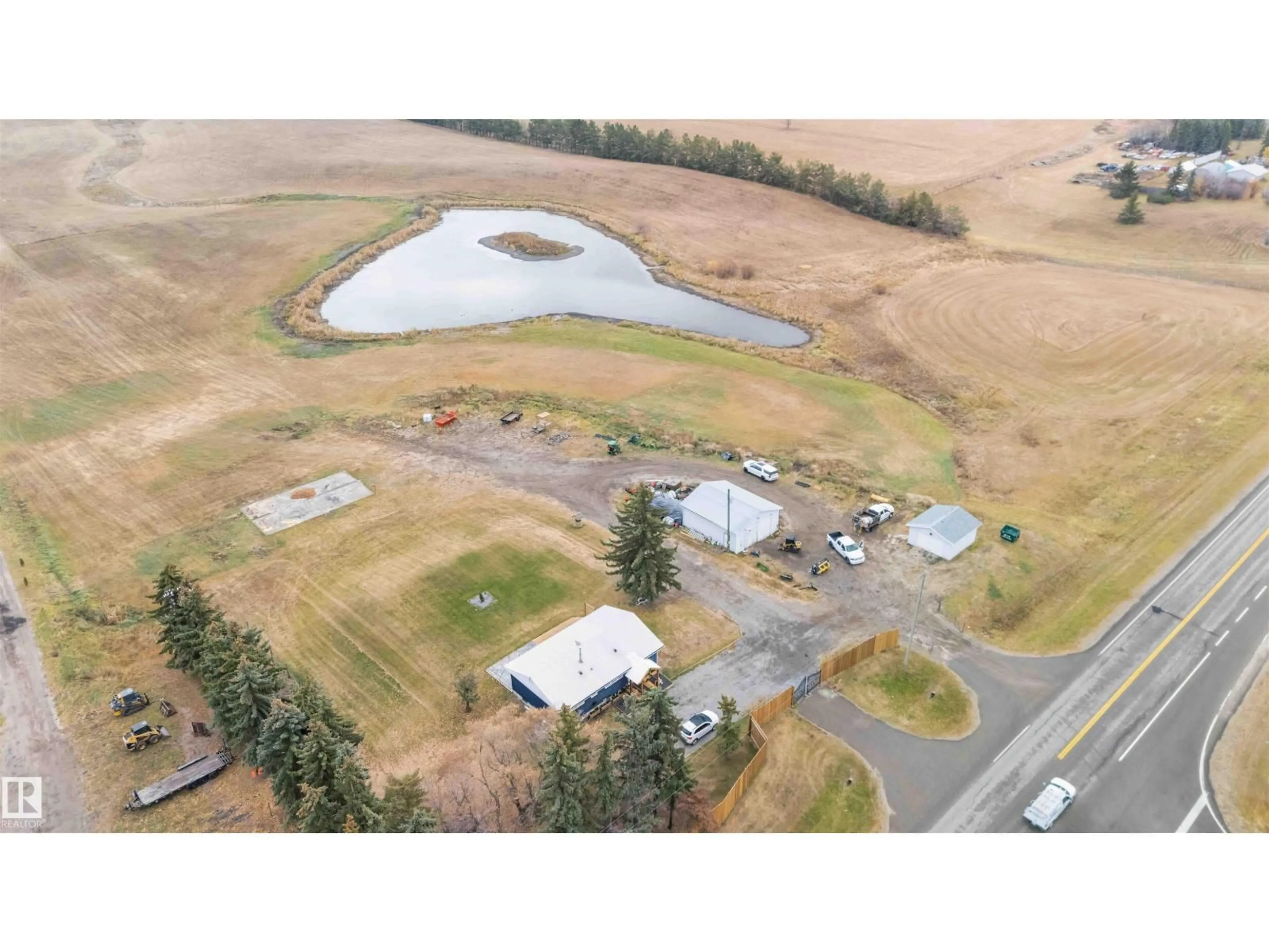 A pic from outside/outdoor area/front of a property/back of a property/a pic from drone, water/lake/river/ocean view for 53273 RGE ROAD 215, Rural Strathcona County Alberta T8E2B4