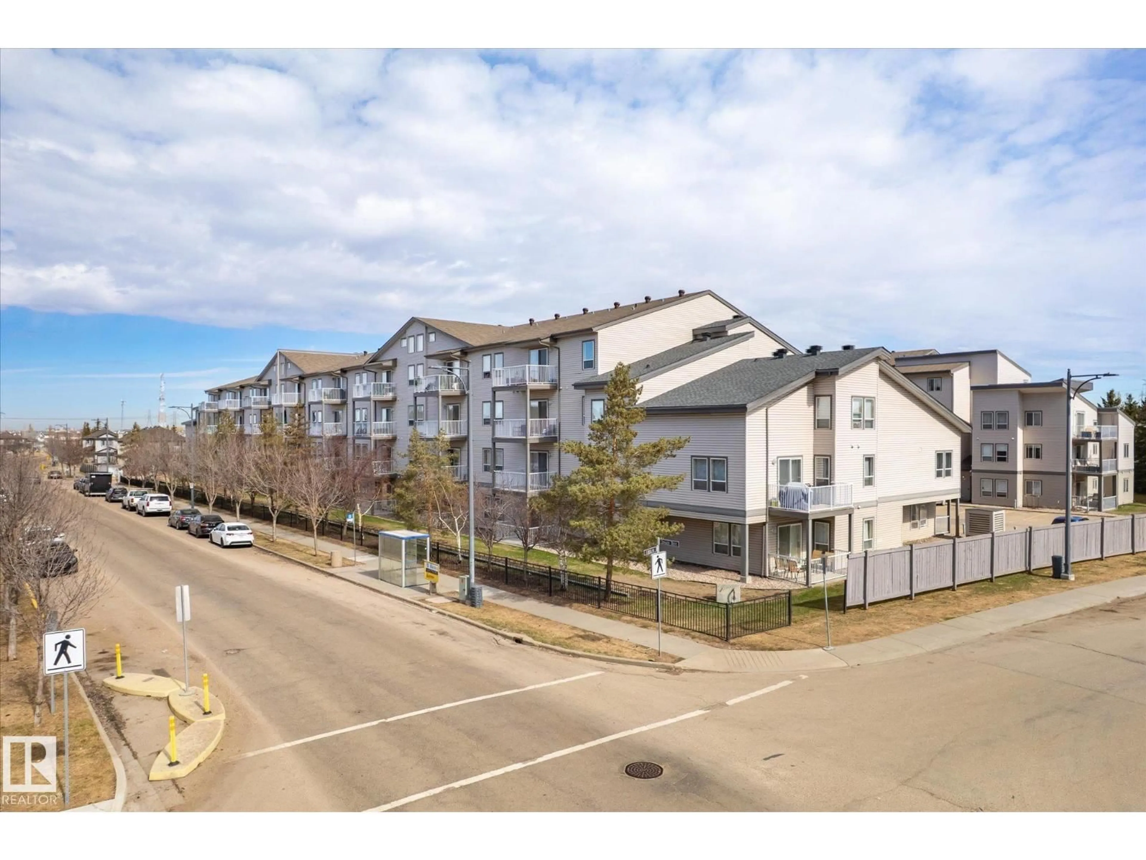 A pic from outside/outdoor area/front of a property/back of a property/a pic from drone, street for #203 - 155 EDWARDS DR, Edmonton Alberta T6X1N6