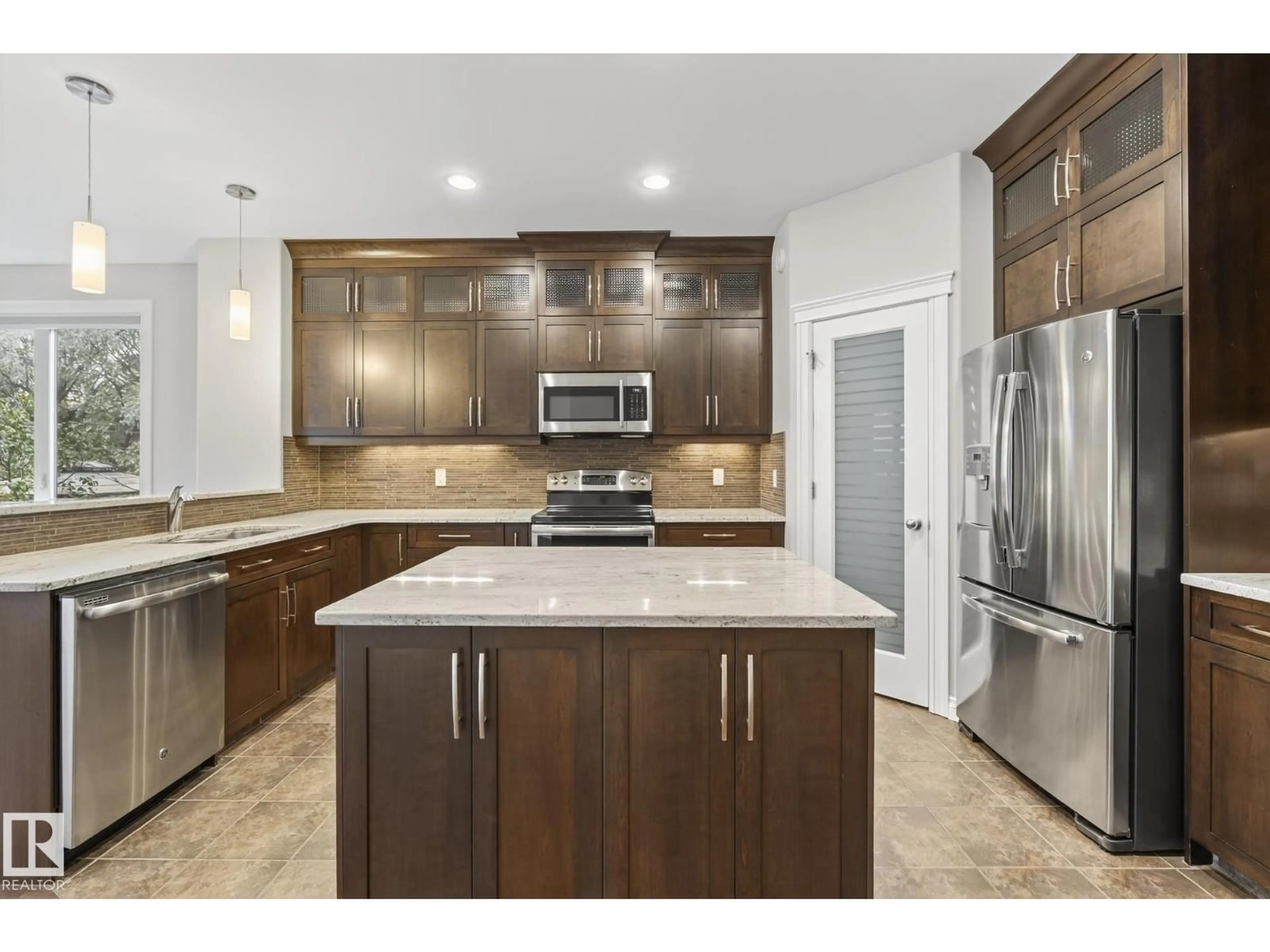 Open concept kitchen, ceramic/tile floor for 11106 76 AV, Edmonton Alberta T6G0J8