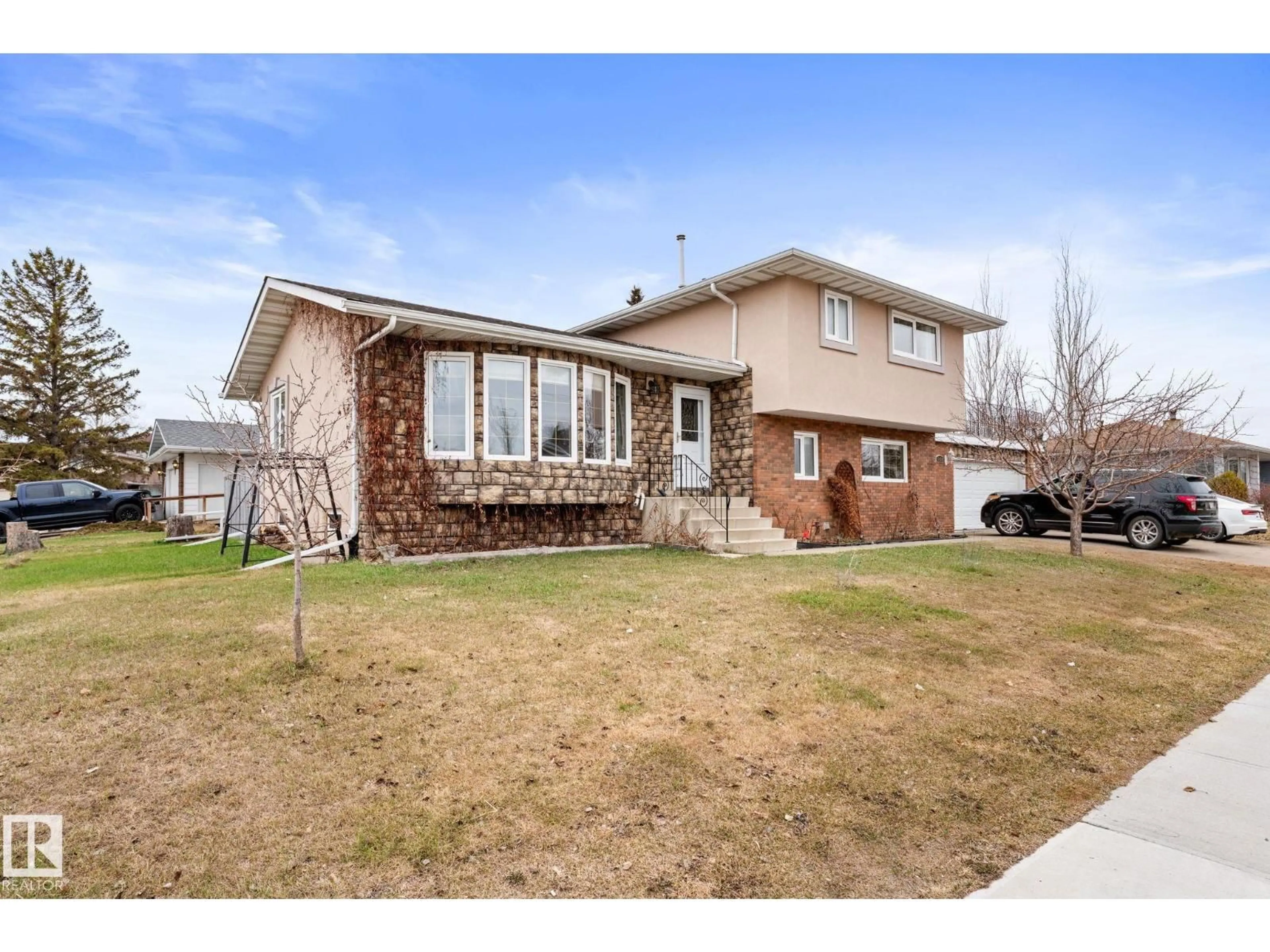 Home with brick exterior material, unknown for 16424 106 ST, Edmonton Alberta T5X1W5